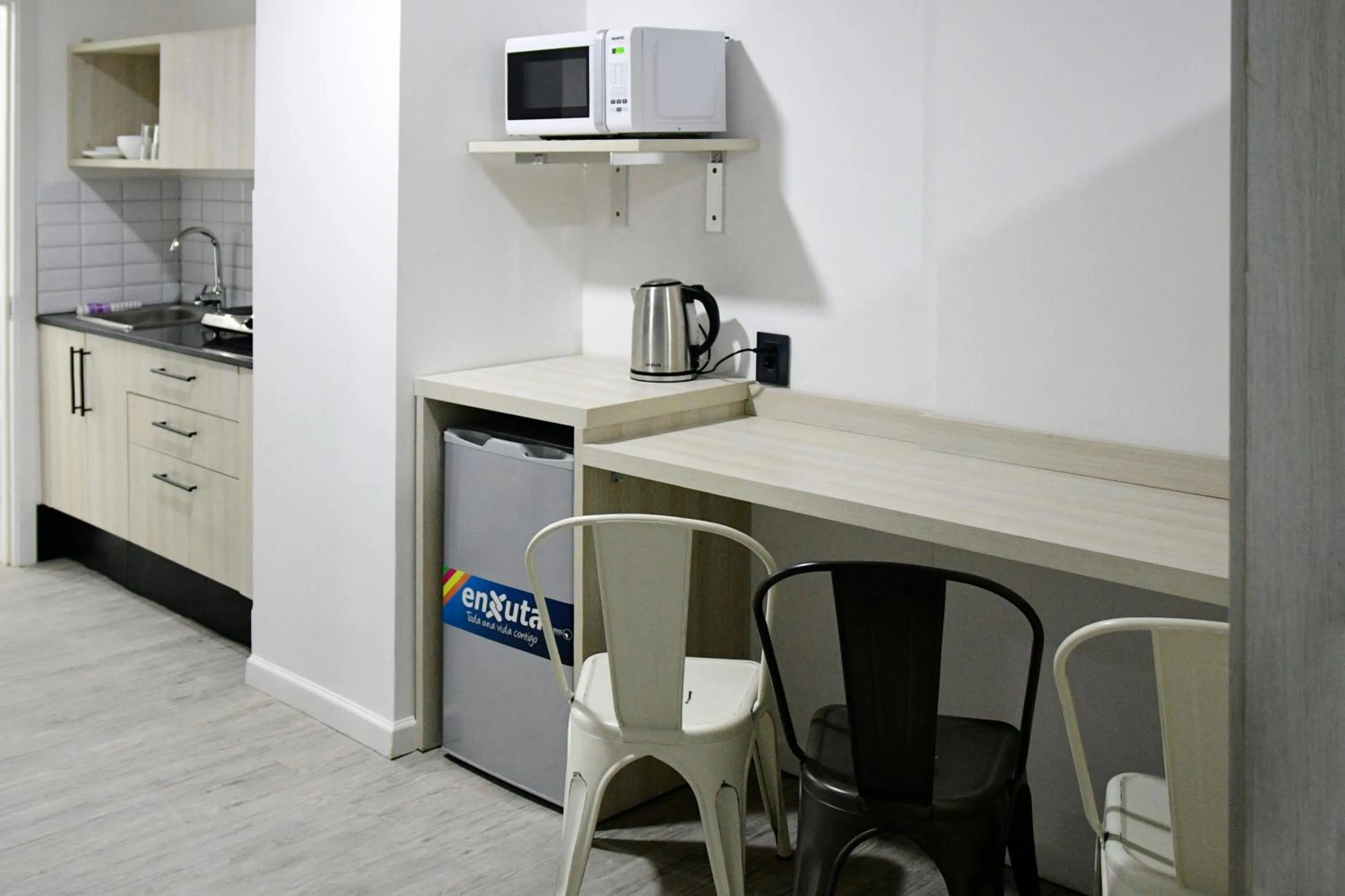 Kitchen or kitchenette in Quijano Hotel - Aparts & Suites