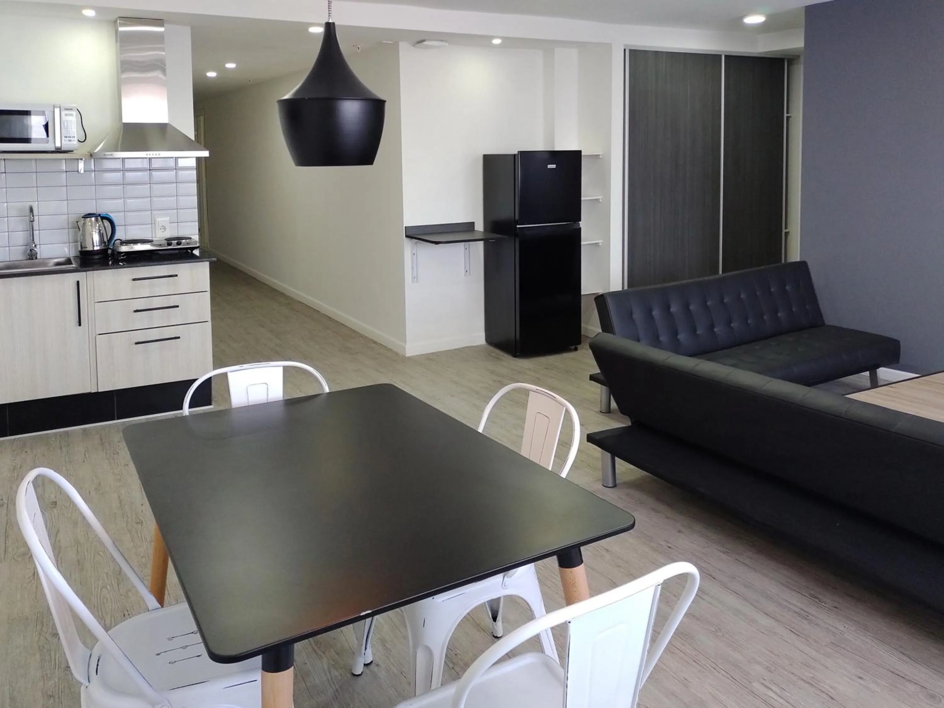 Kitchen or kitchenette in Quijano Hotel - Aparts & Suites