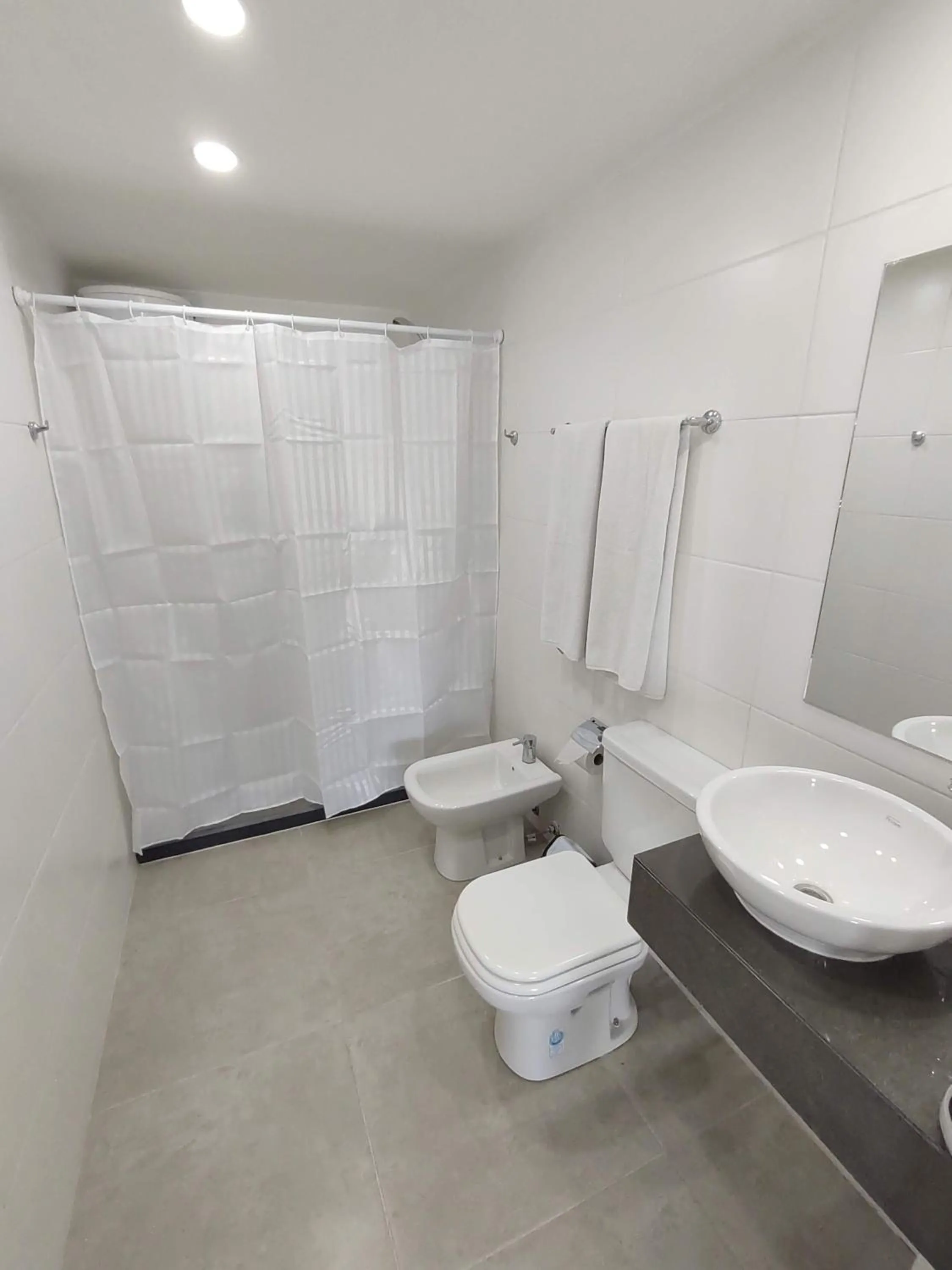 Bathroom in Quijano Hotel - Aparts & Suites