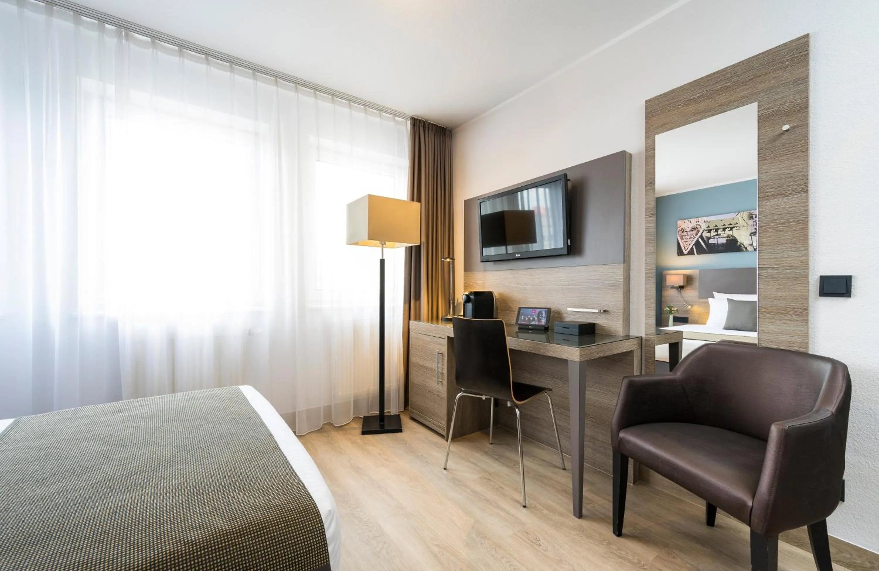 Photo of the whole room, Bed in Leonardo Hotel Nürnberg