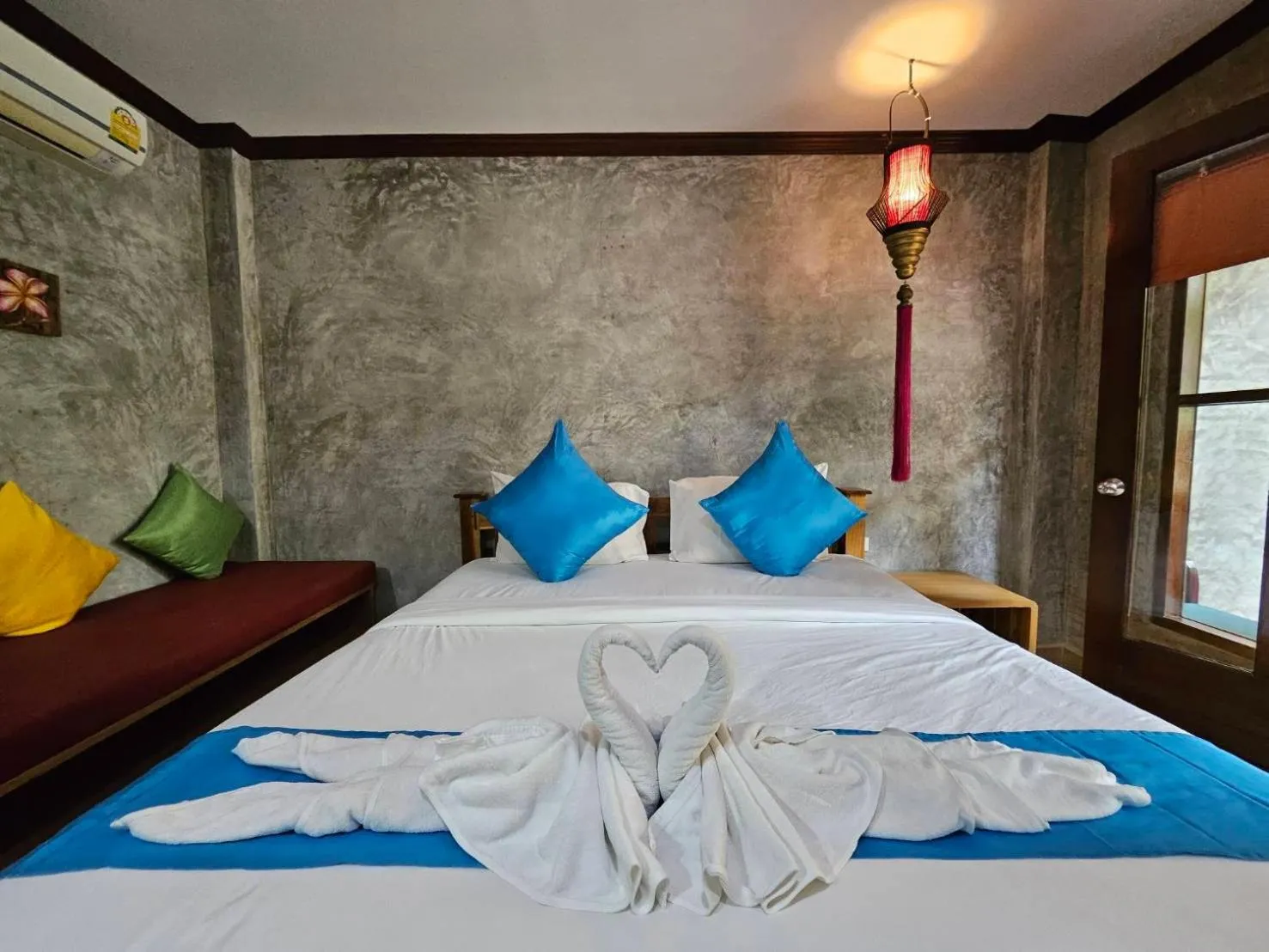 Bed in Araya Boutique Hotel