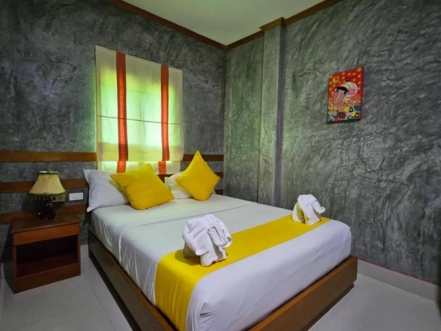 Bed in Araya Boutique Hotel