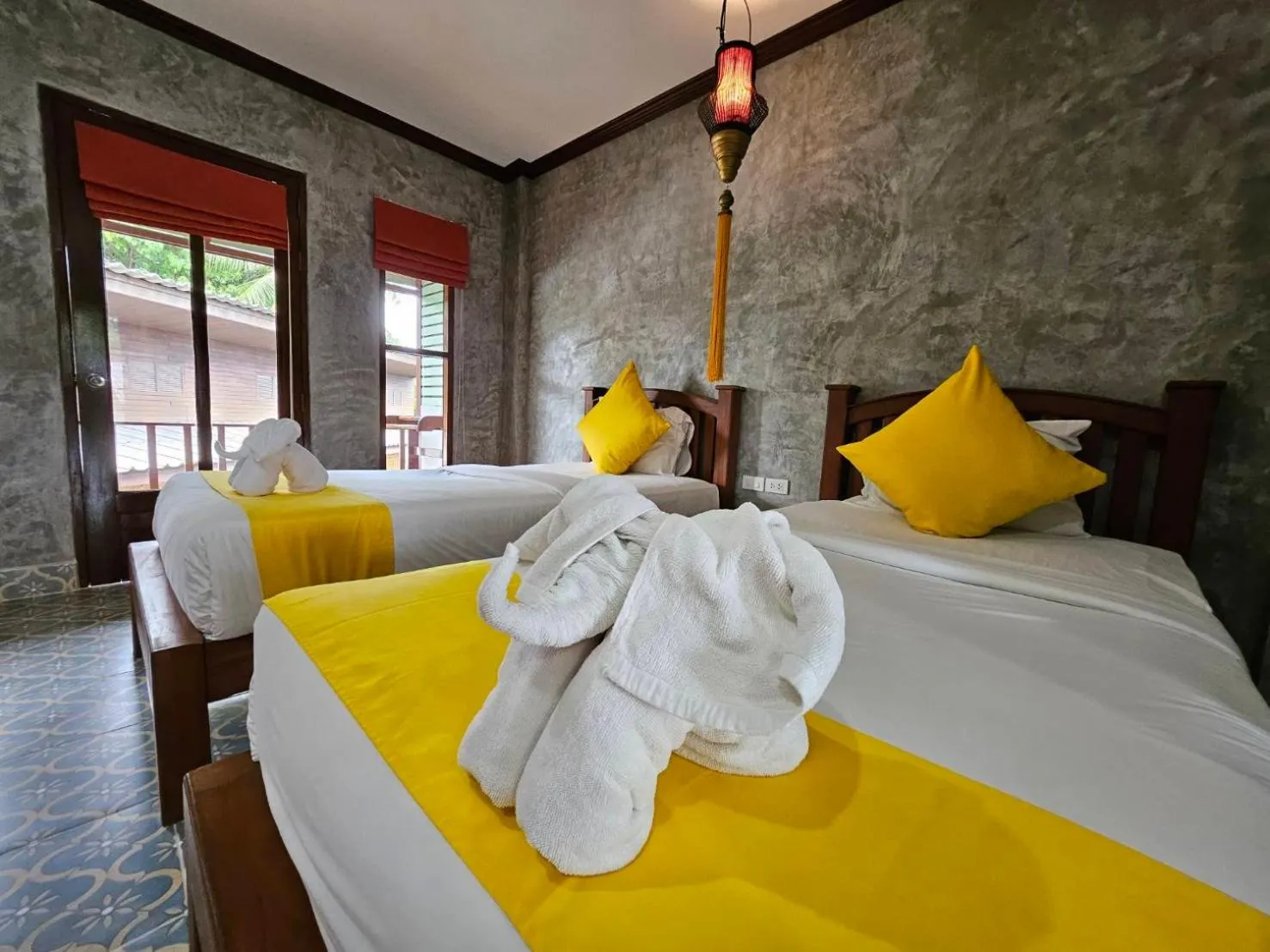 Bed in Araya Boutique Hotel