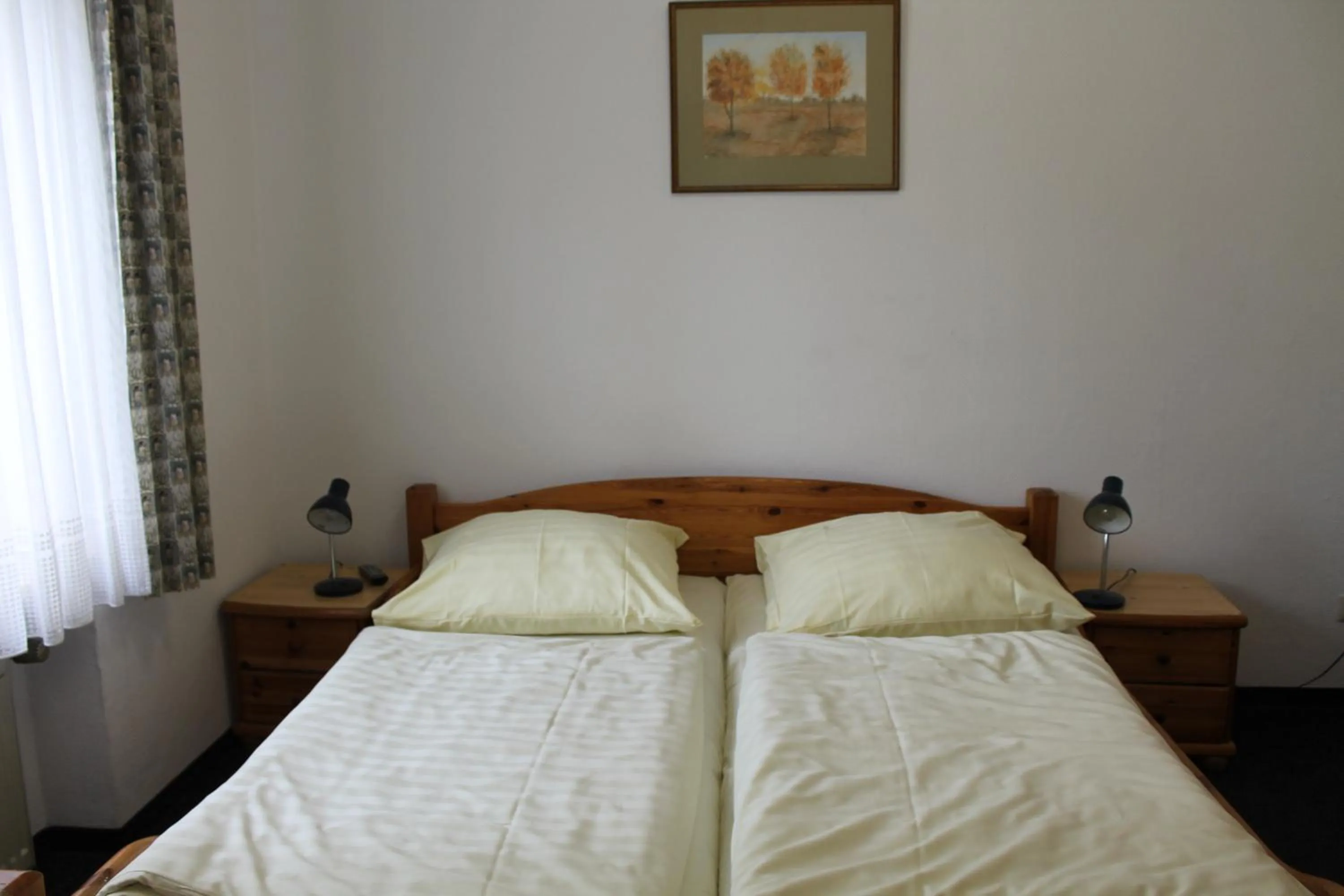 Bed in Pension Locarno
