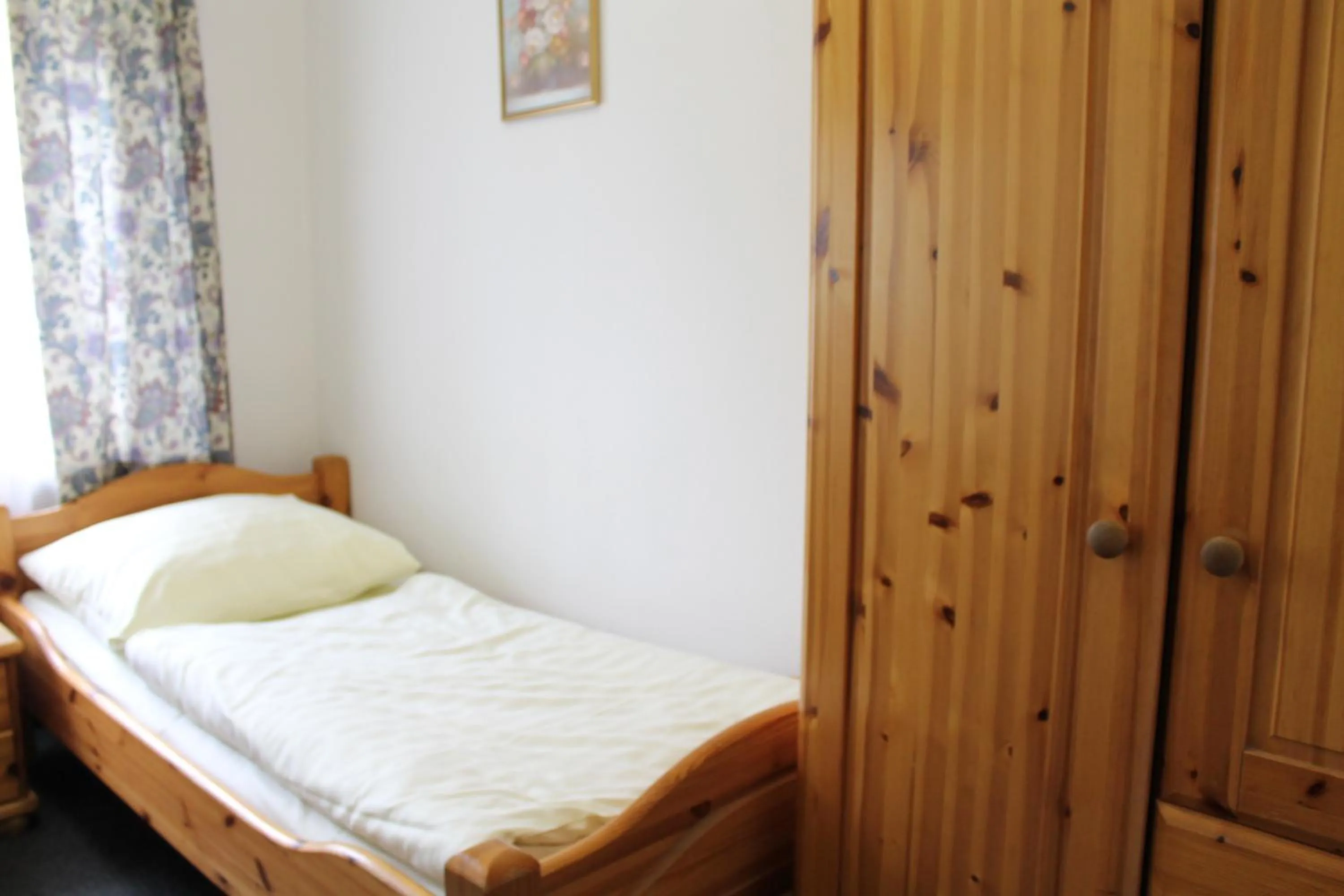 Bed in Pension Locarno