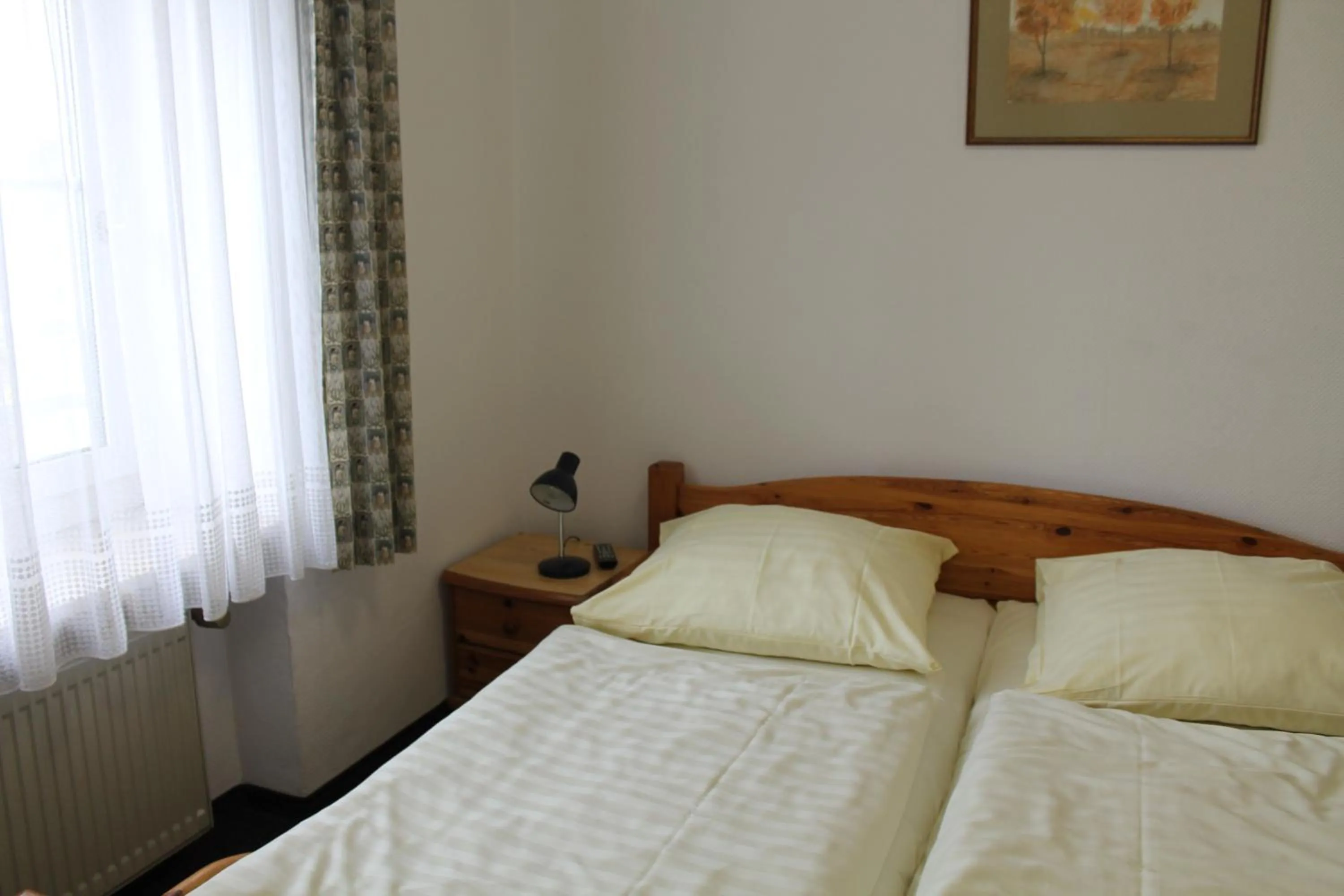 Bed in Pension Locarno