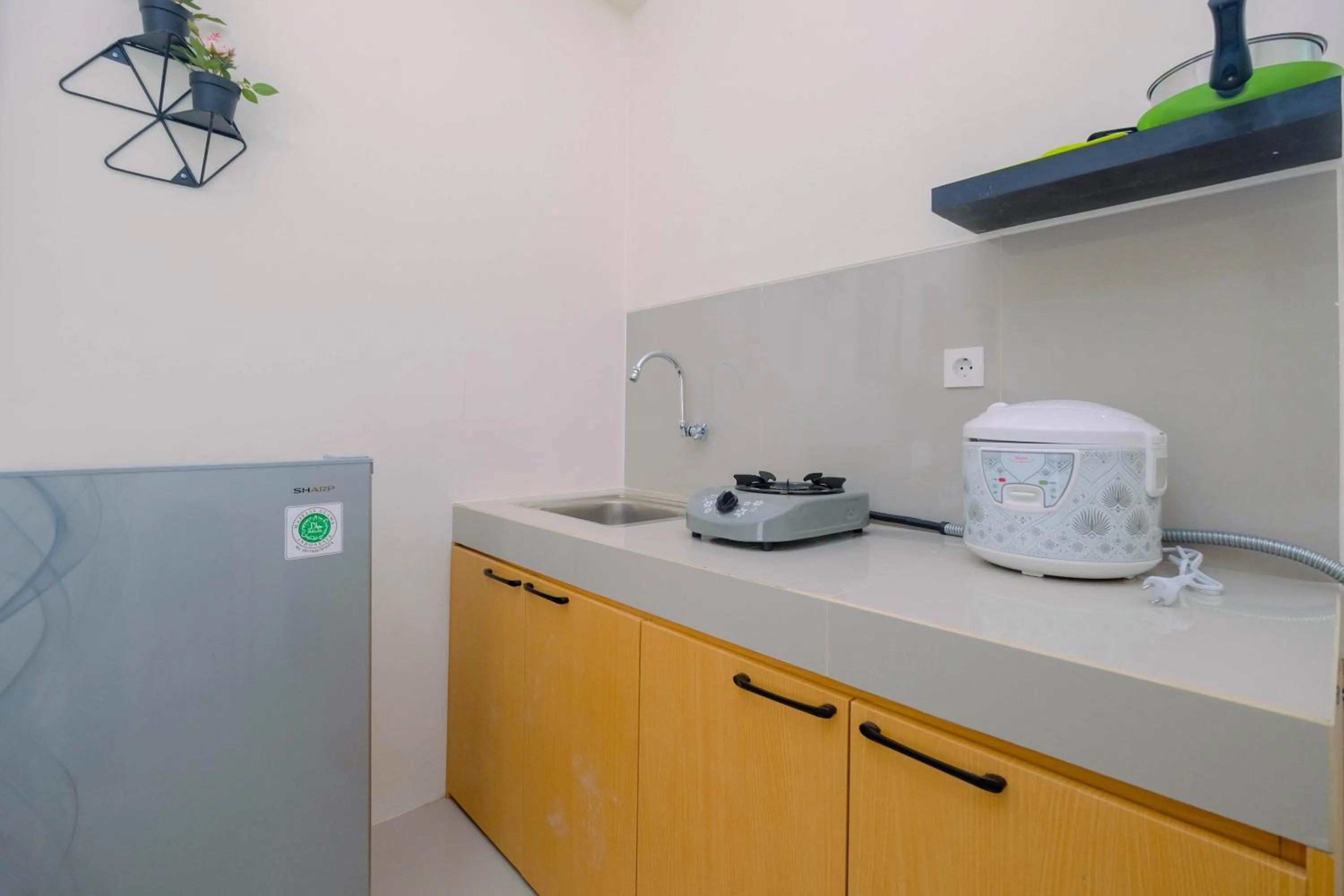 Comfy Studio Bogorienze Apartment near The Jungle Fest By Travelio