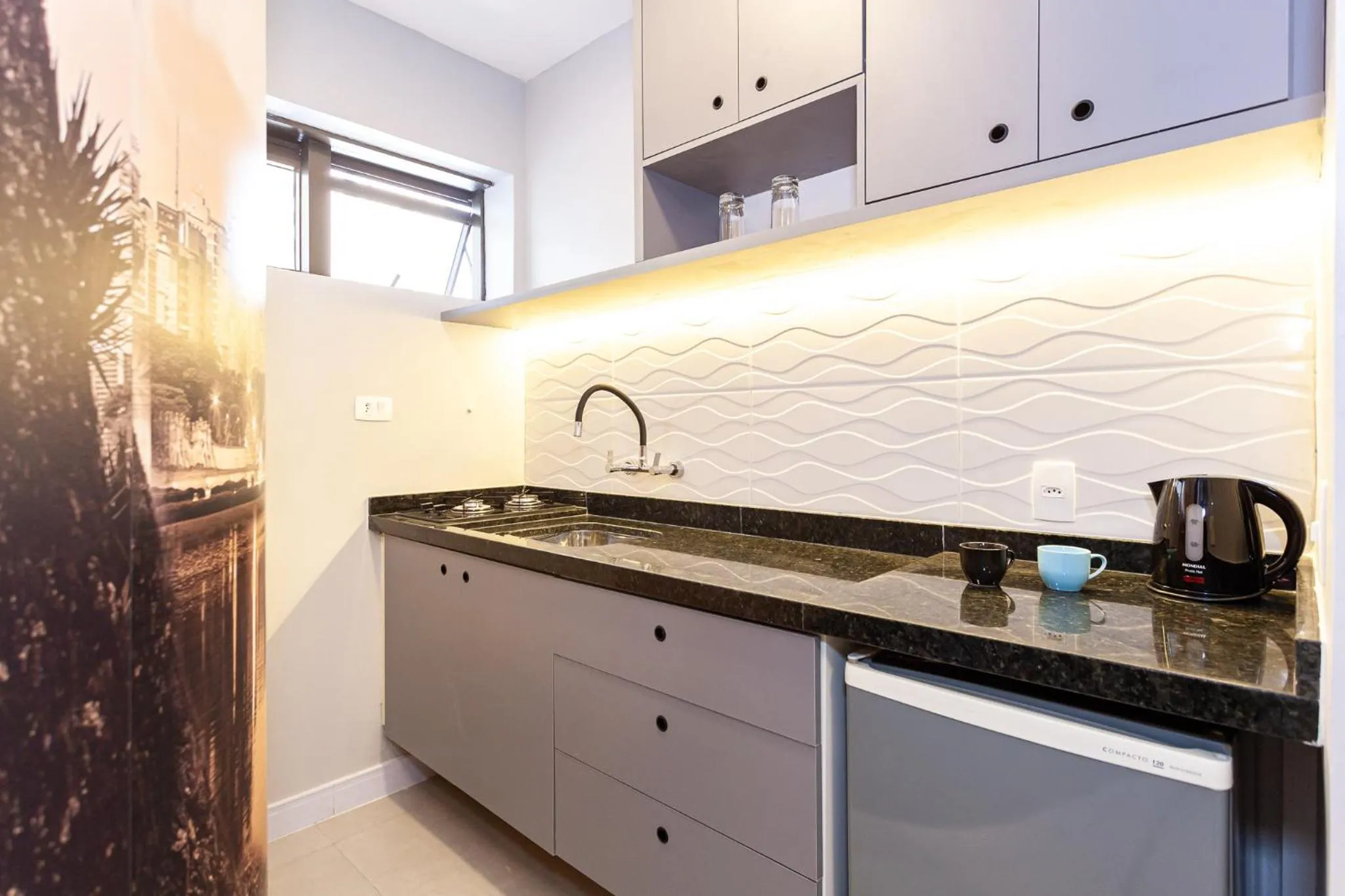 Kitchen or kitchenette in Travel Inn Premium Flats Paulista Wall Street