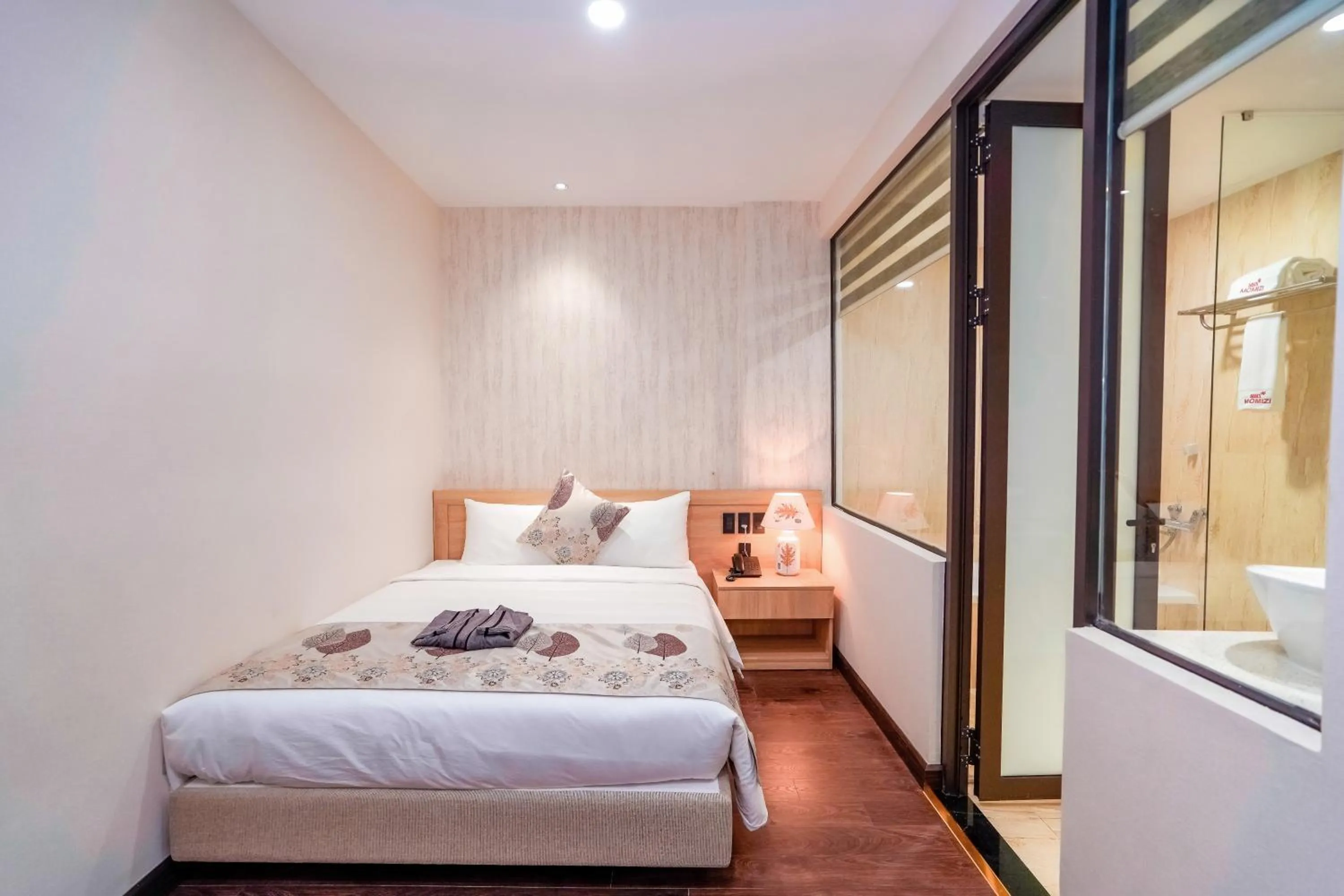 Bed in MOMIZI Hotel HAI PHONG