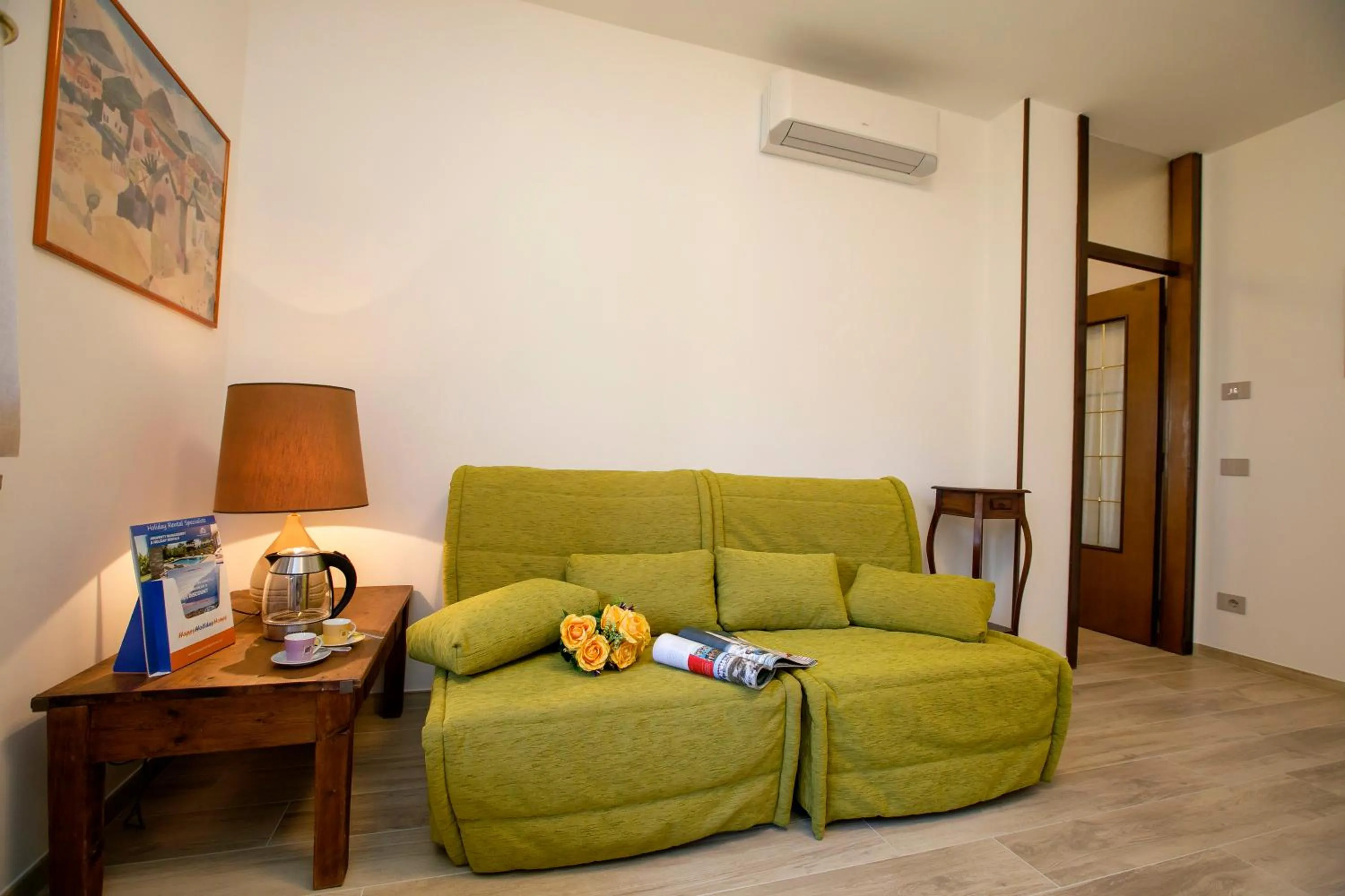 Living room in Bella Arco Apartment - Happy Rentals