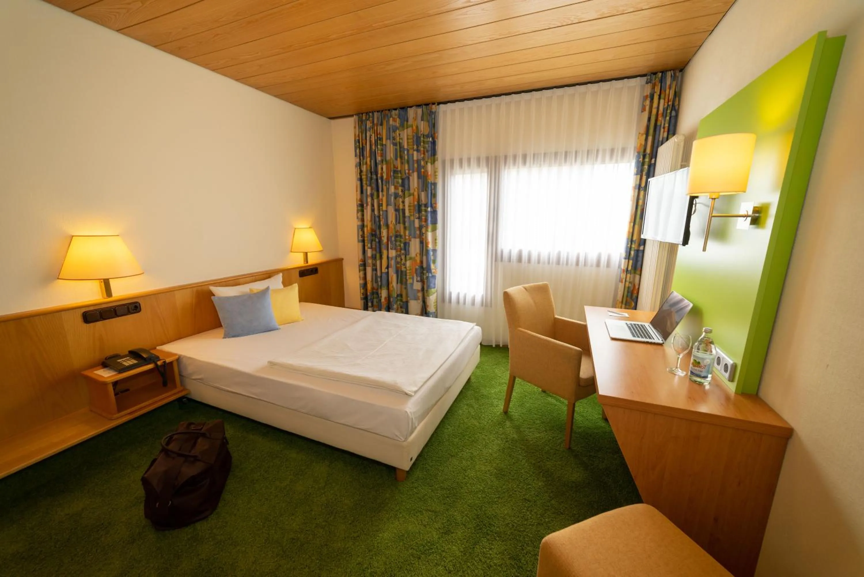 Photo of the whole room, Bed in Stadt-gut-Hotel Filderhotel