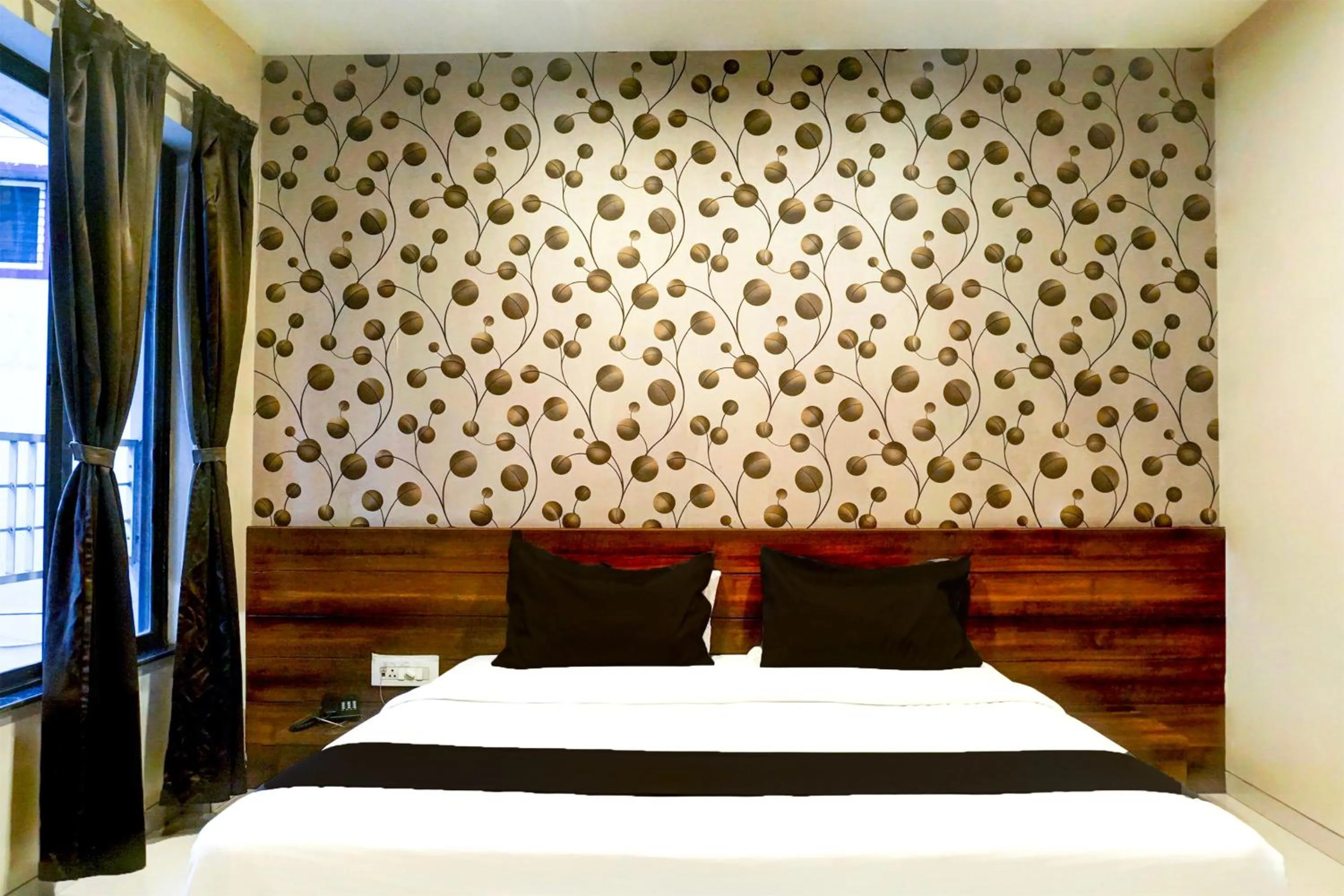 Bedroom, Bed in Super Townhouse Oak Viman Nagar Formerly Kuber Inn