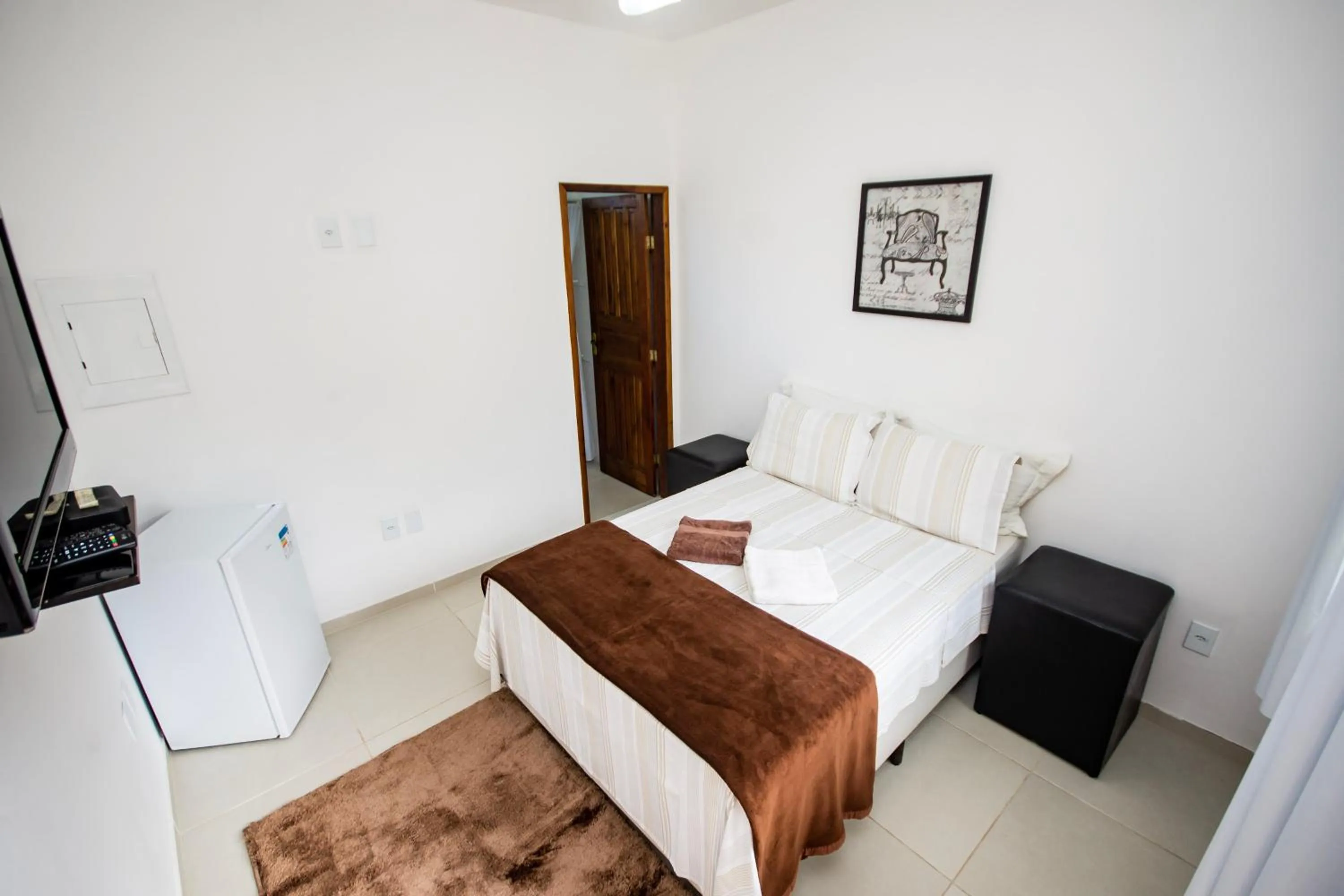 Bed in Pousada Quatro Estações Paraty