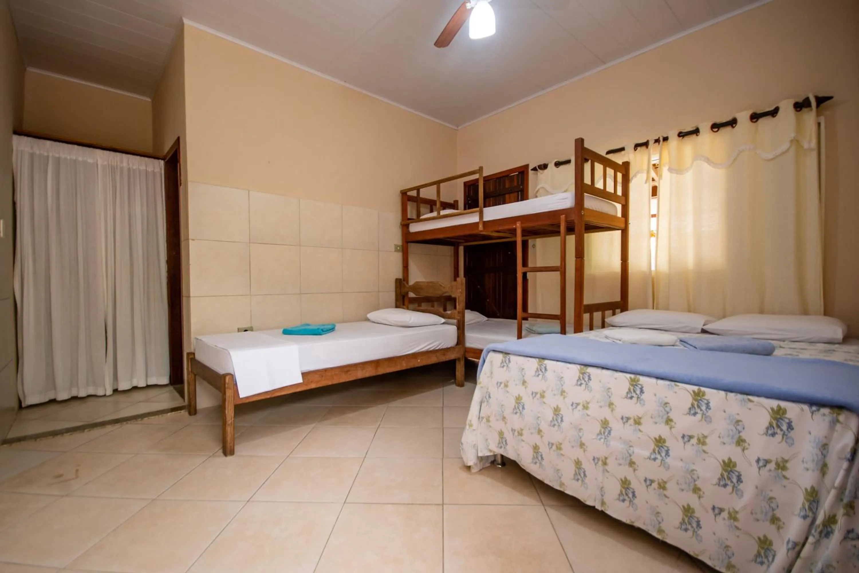 Photo of the whole room, Bed in Pousada Quatro Estações Paraty