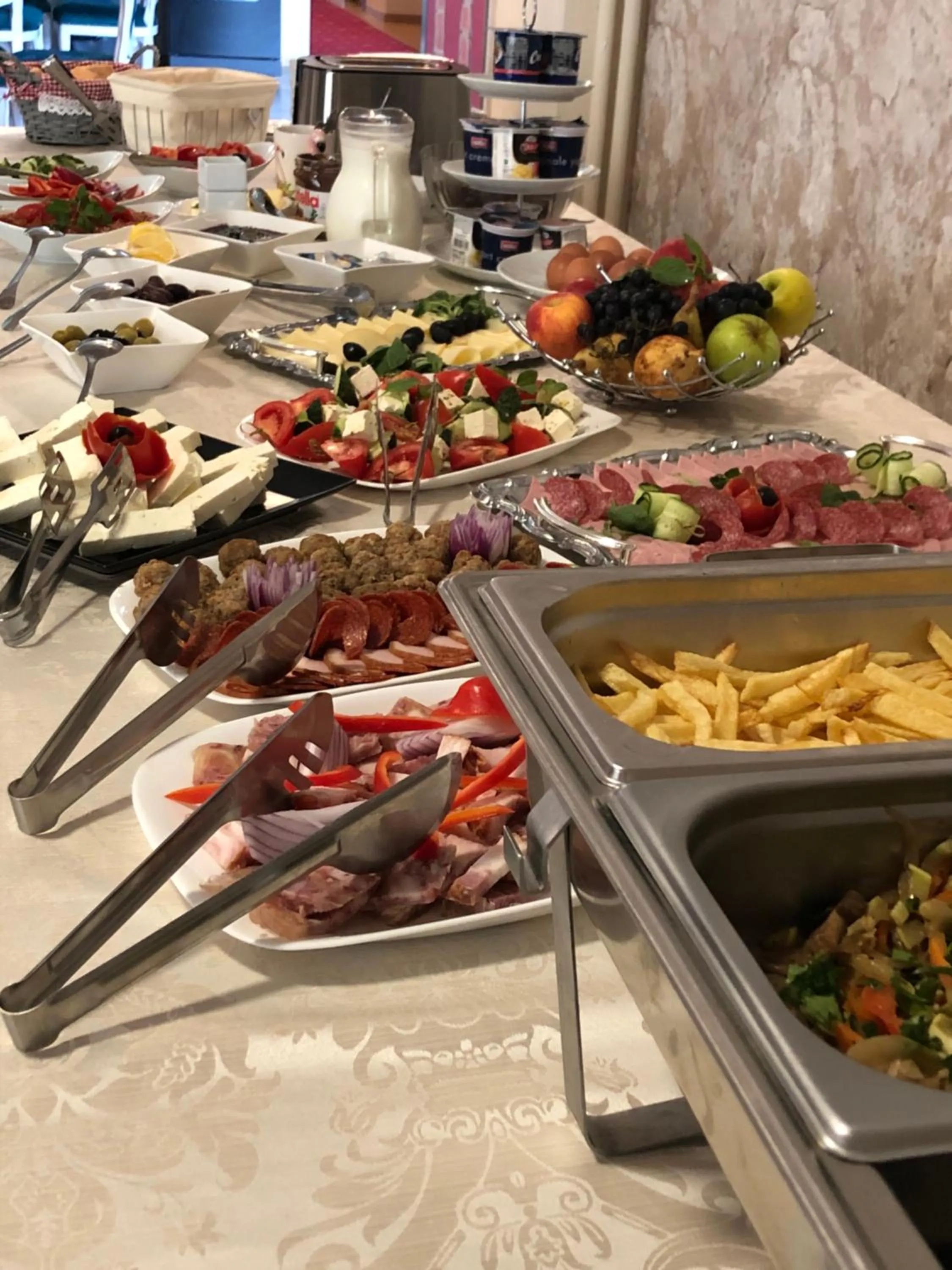 Buffet breakfast in Park Luxury Rooms