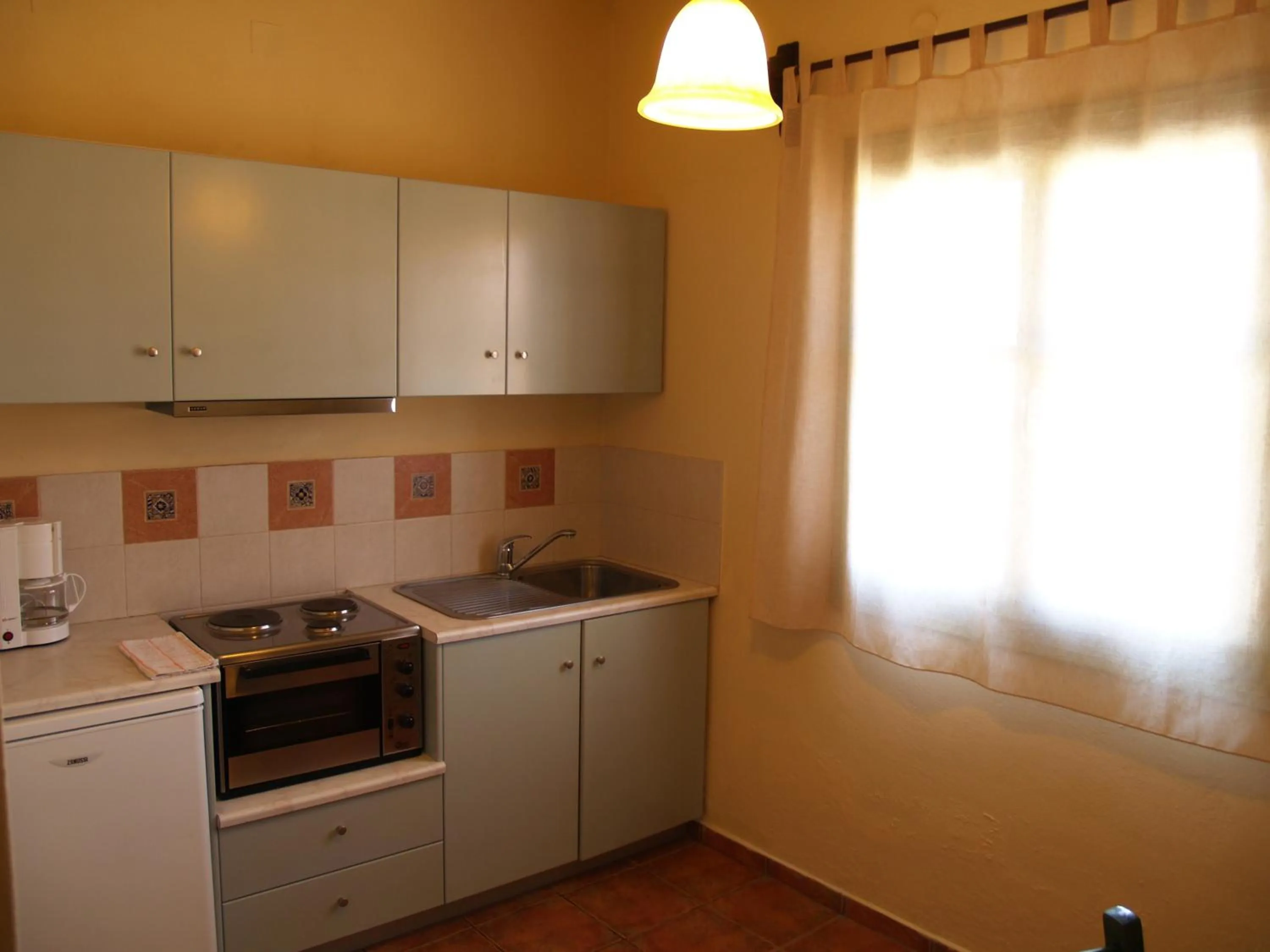 Kitchen or kitchenette in Mandilada Village