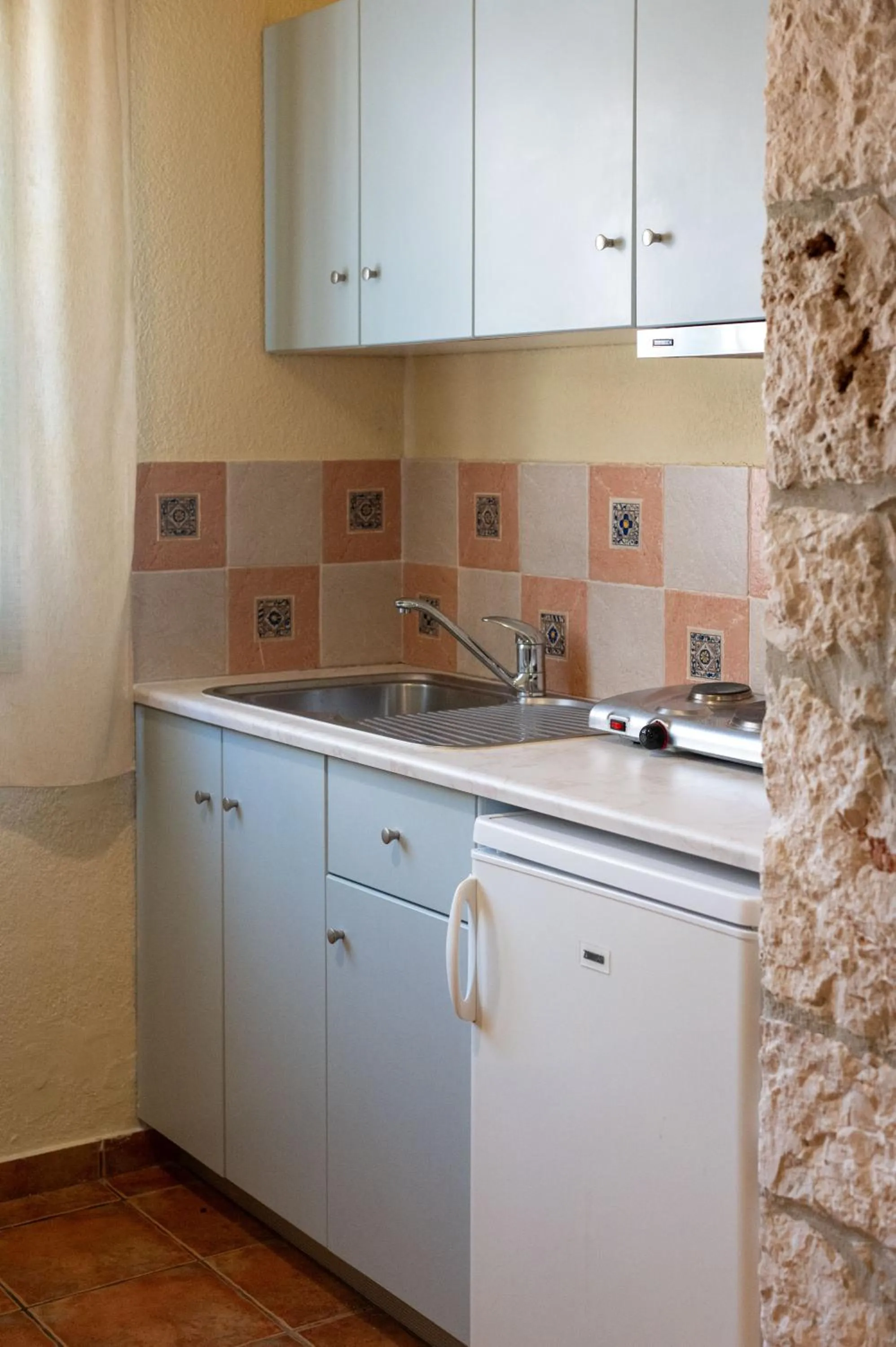 Kitchen or kitchenette in Mandilada Village