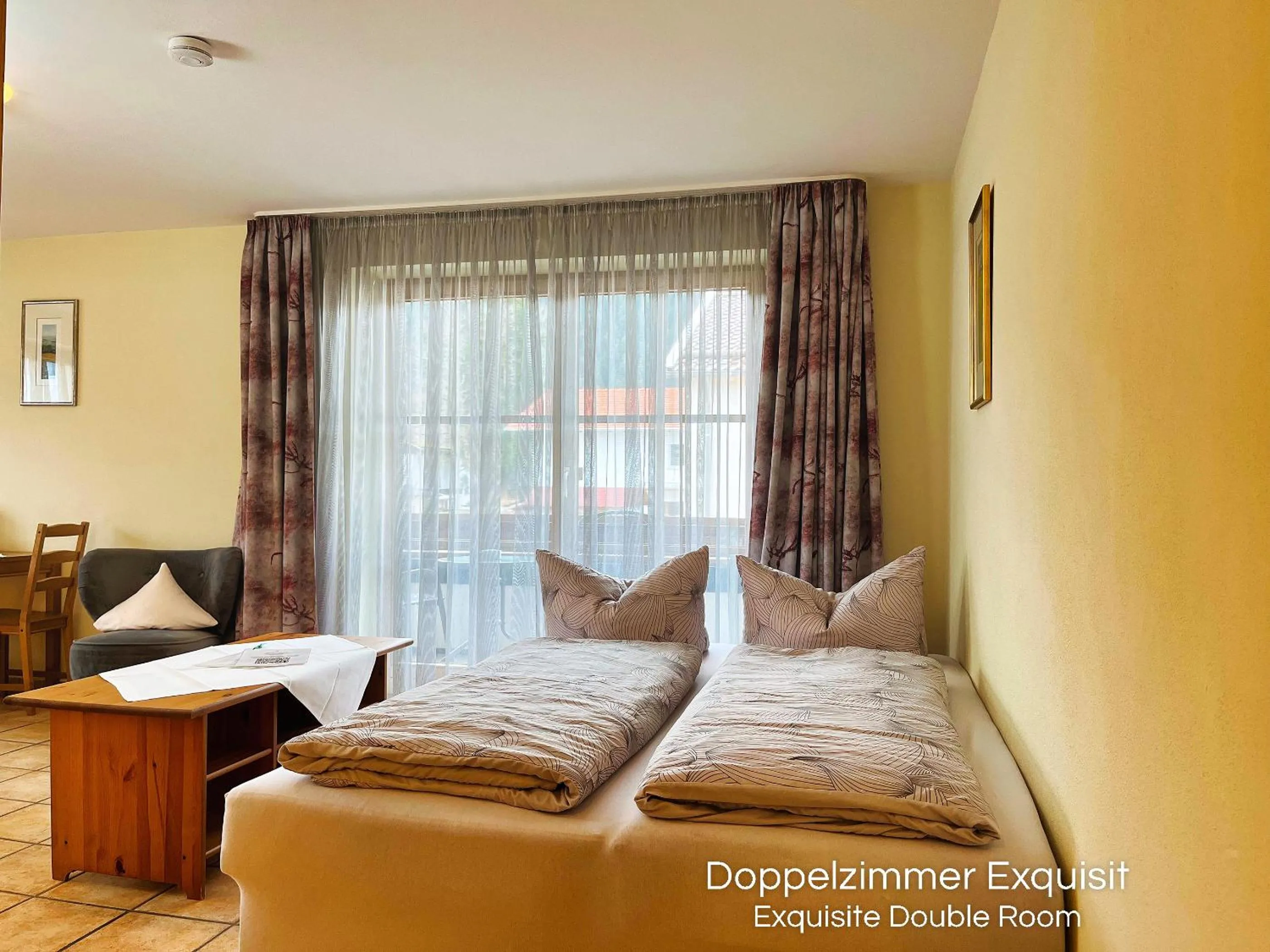 Photo of the whole room, Bed in Landhotel Guglhupf