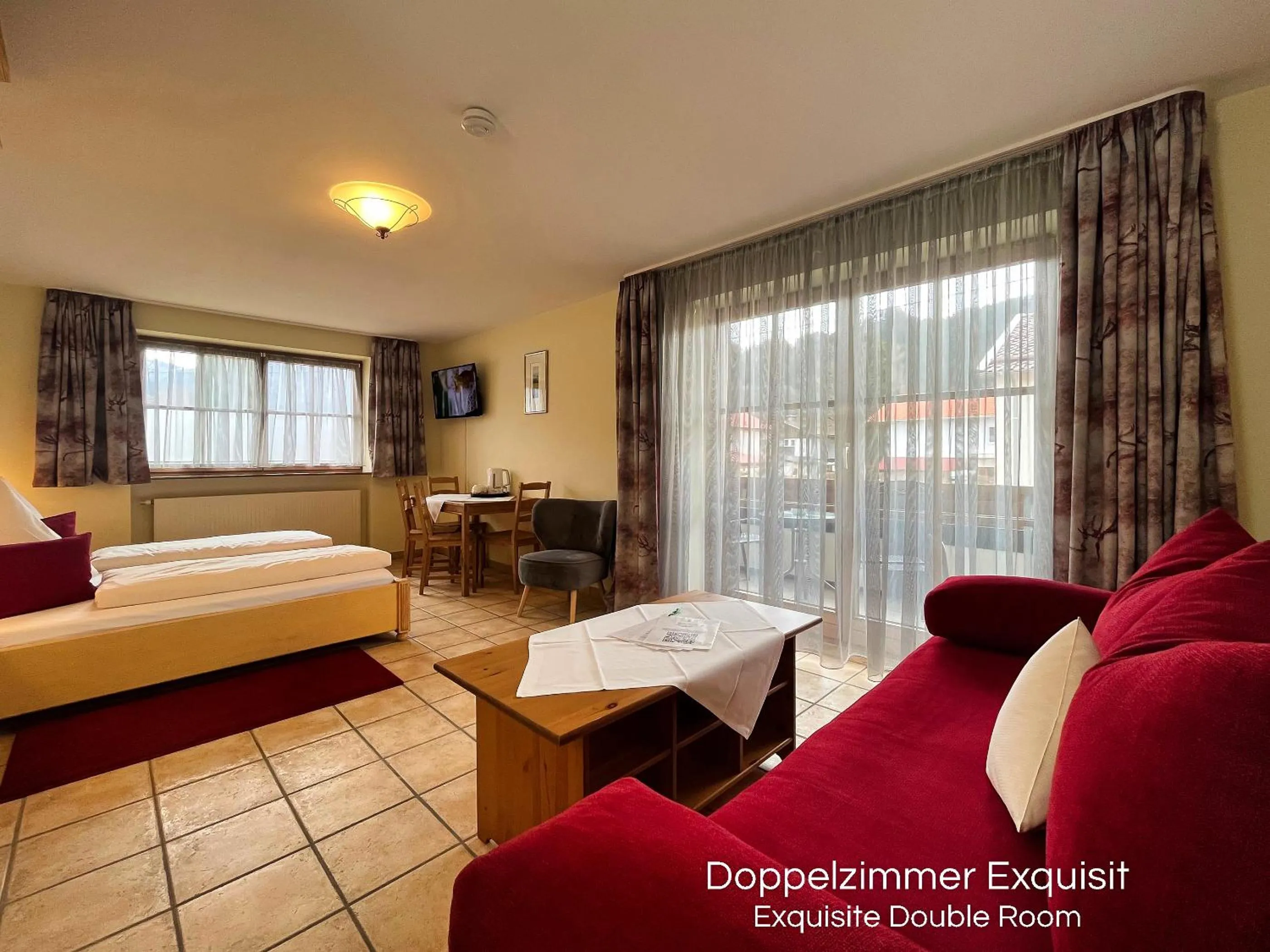 Photo of the whole room, Bed in Landhotel Guglhupf