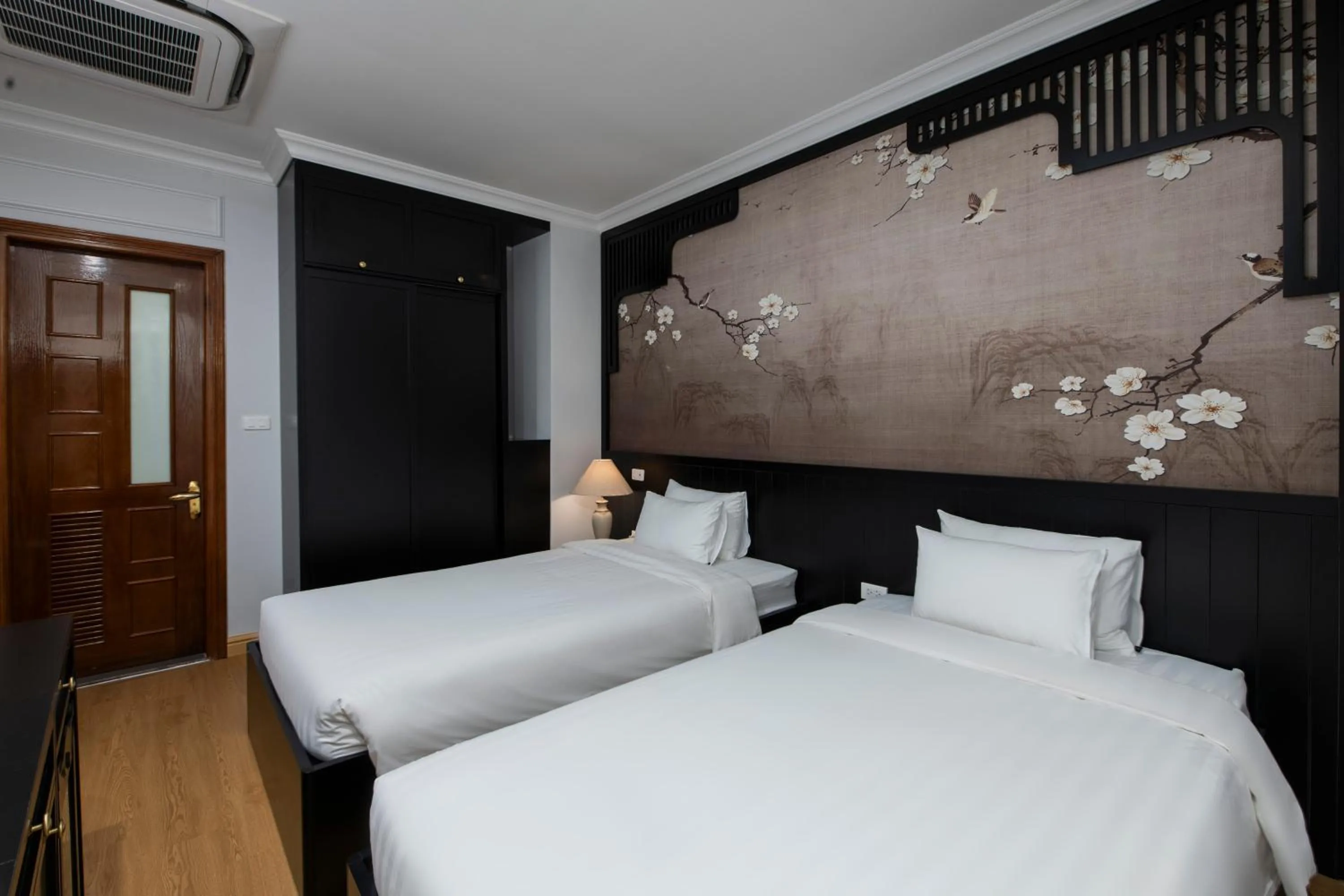 Bed in San Premium Hotel