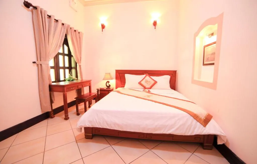 Bed in Gold Rooster Resort