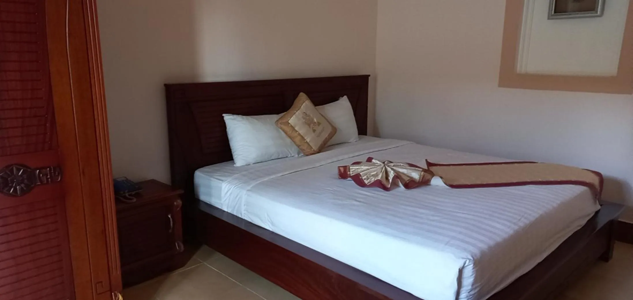 Bed in Gold Rooster Resort