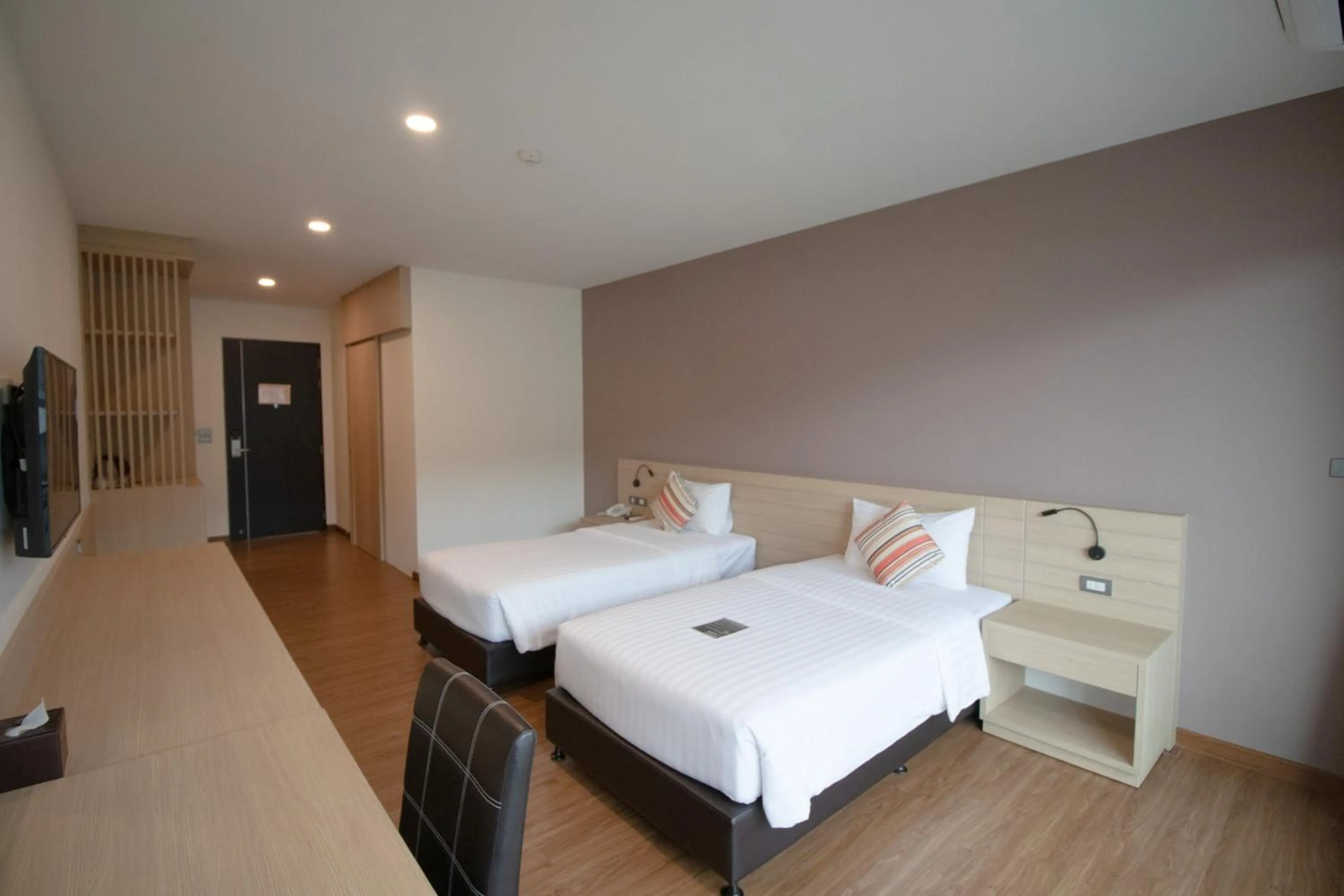Bed in Phavina Hotel & Grand Boutique Rayong