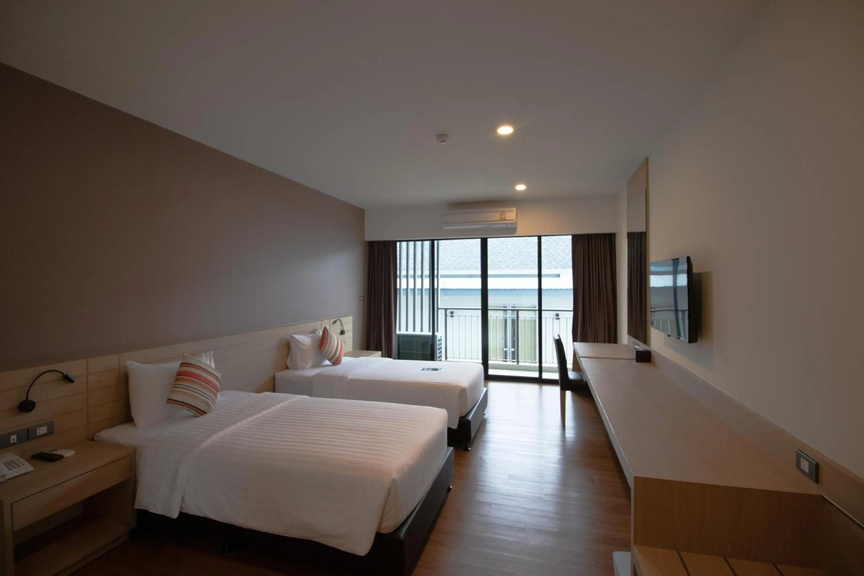 Bed in Phavina Hotel & Grand Boutique Rayong