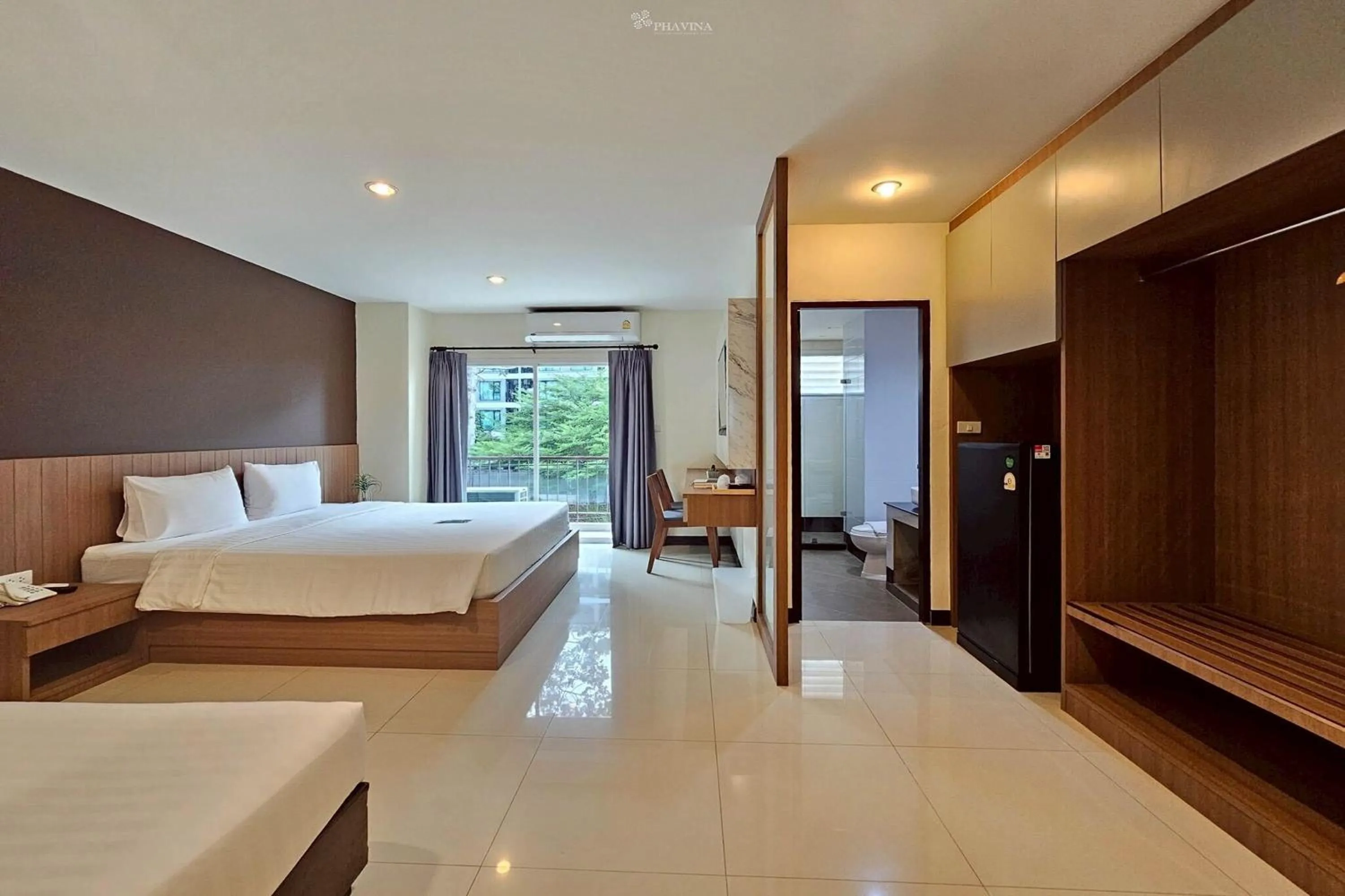 Bed in Phavina Hotel & Grand Boutique Rayong