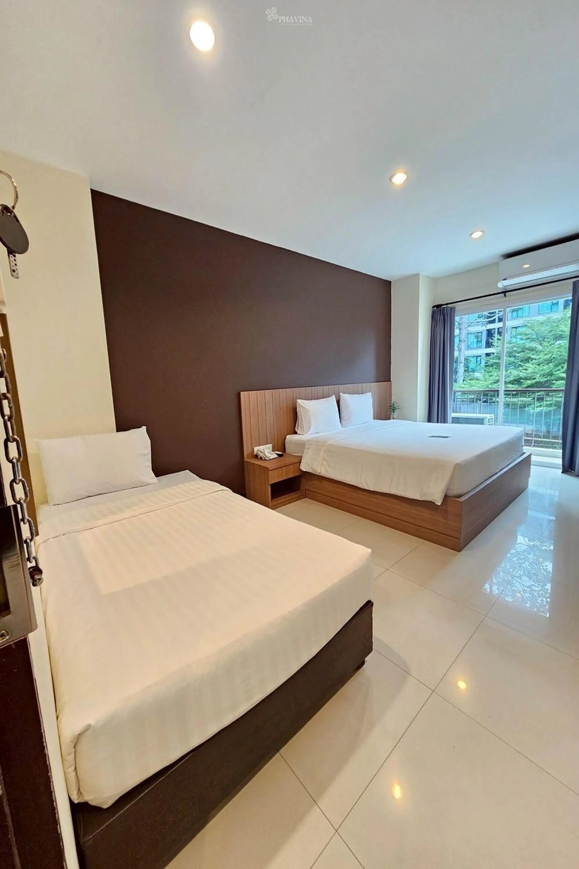 Bed in Phavina Hotel & Grand Boutique Rayong