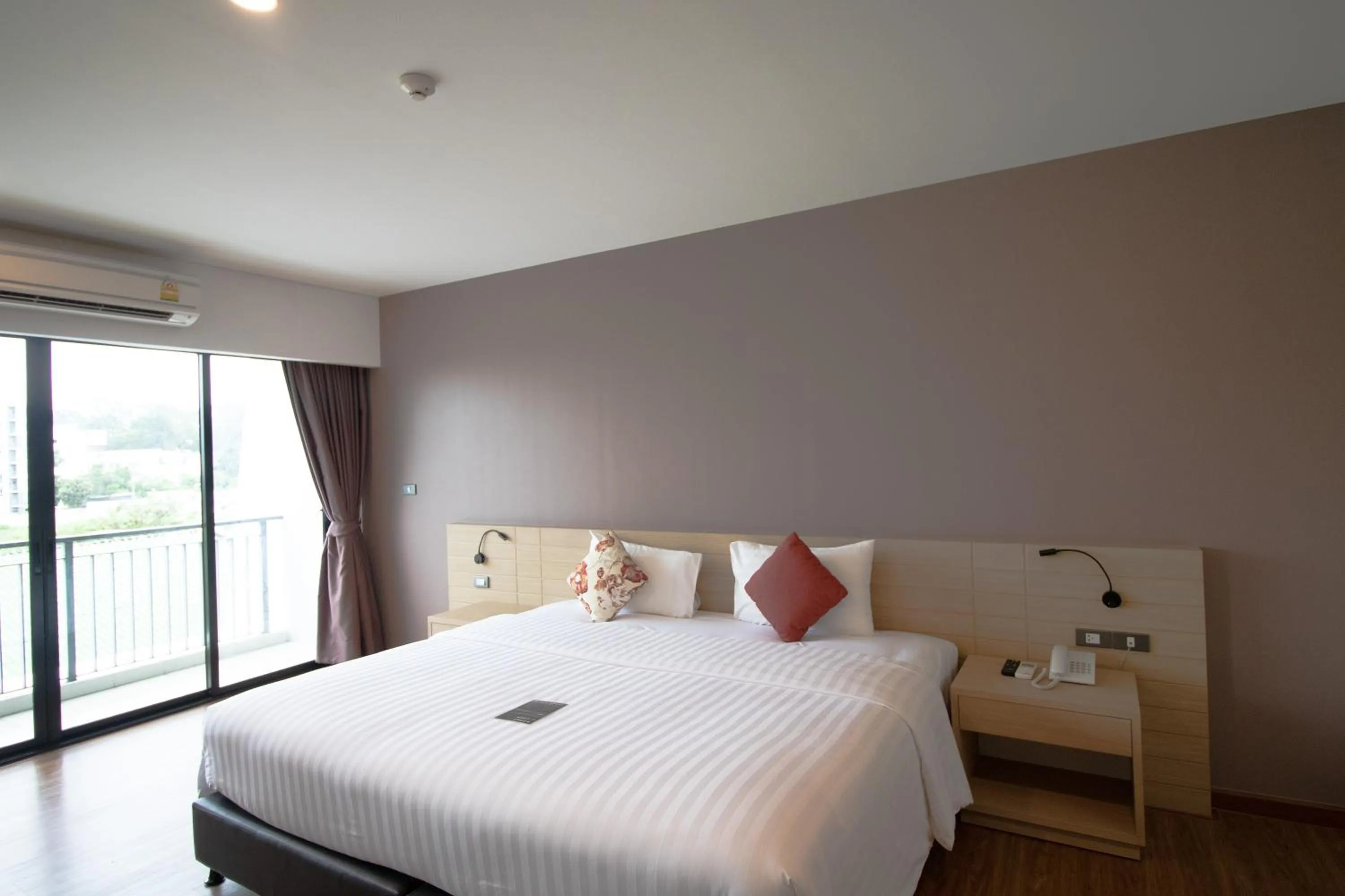 Bed in Phavina Hotel & Grand Boutique Rayong
