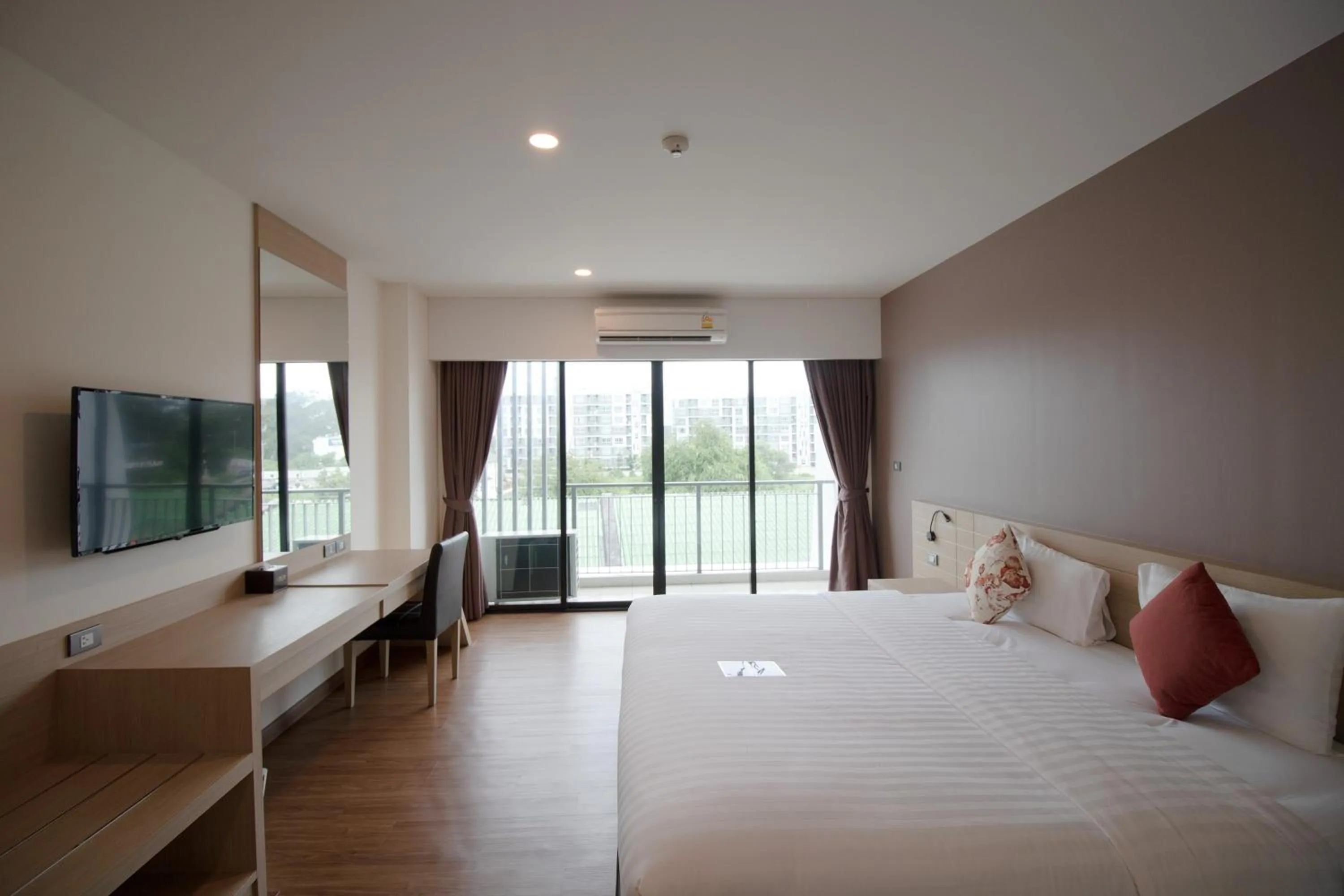 Bed in Phavina Hotel & Grand Boutique Rayong