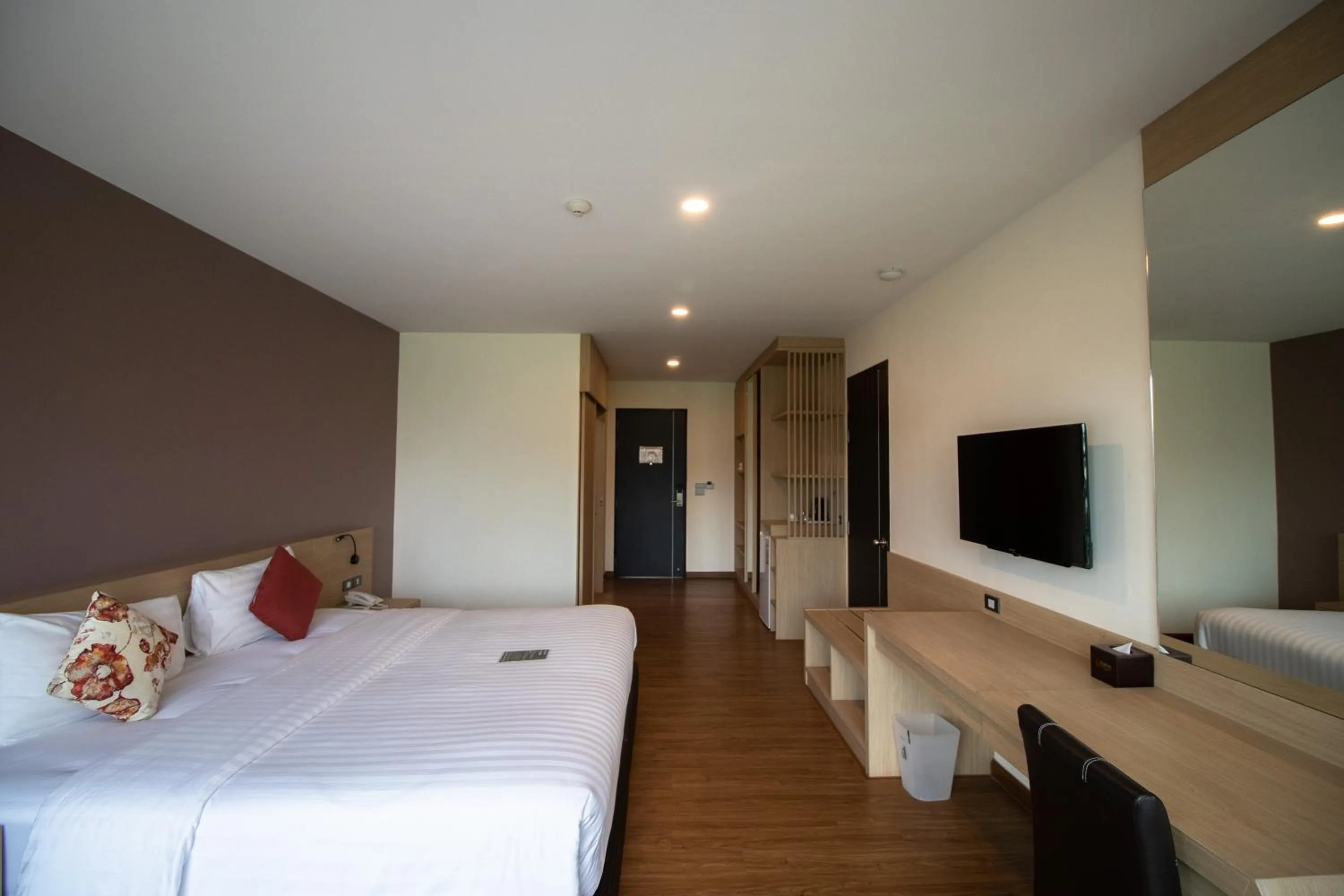 Bed in Phavina Hotel & Grand Boutique Rayong