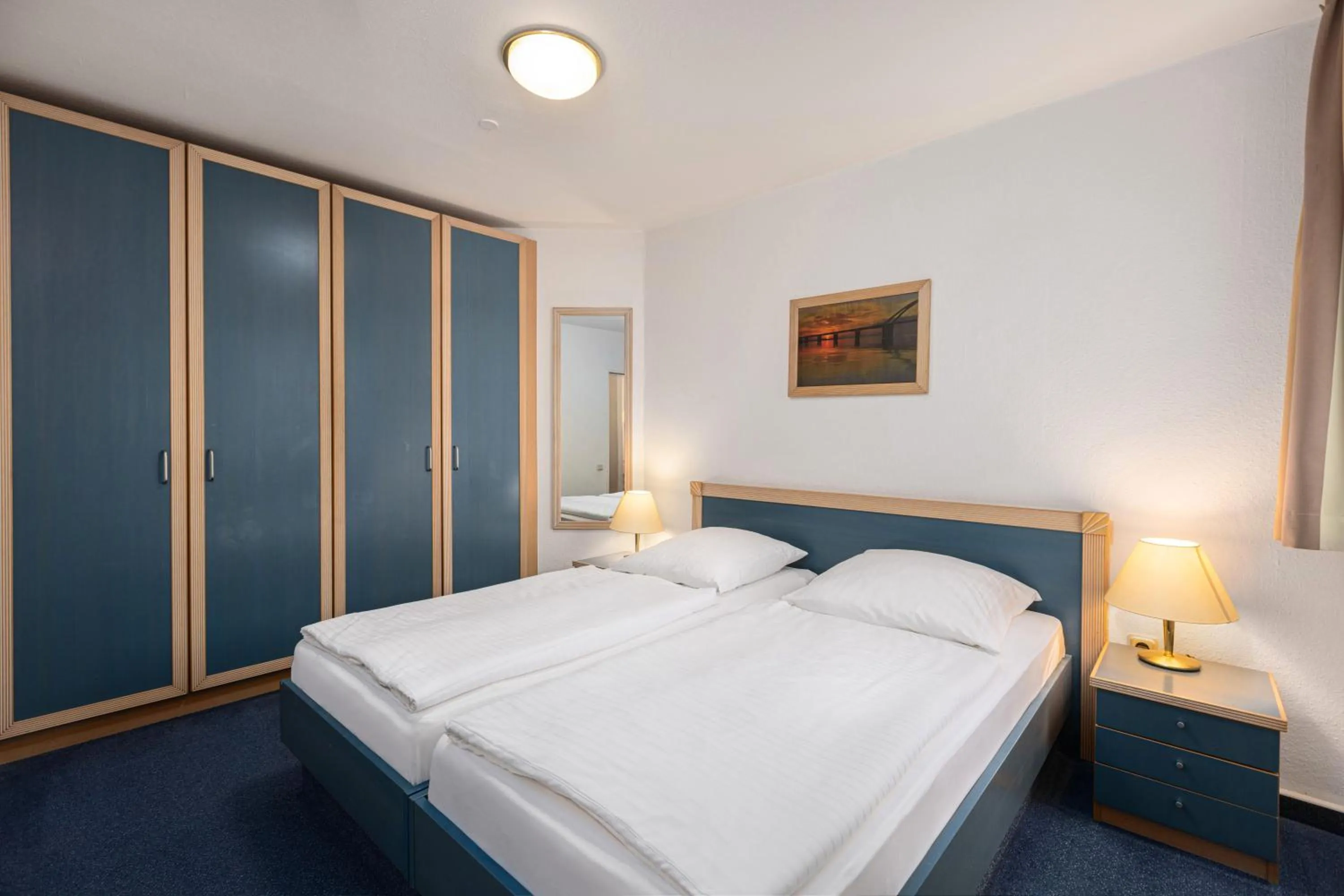 Photo of the whole room, Bed in IFA Fehmarn Hotel & Ferien-Centrum