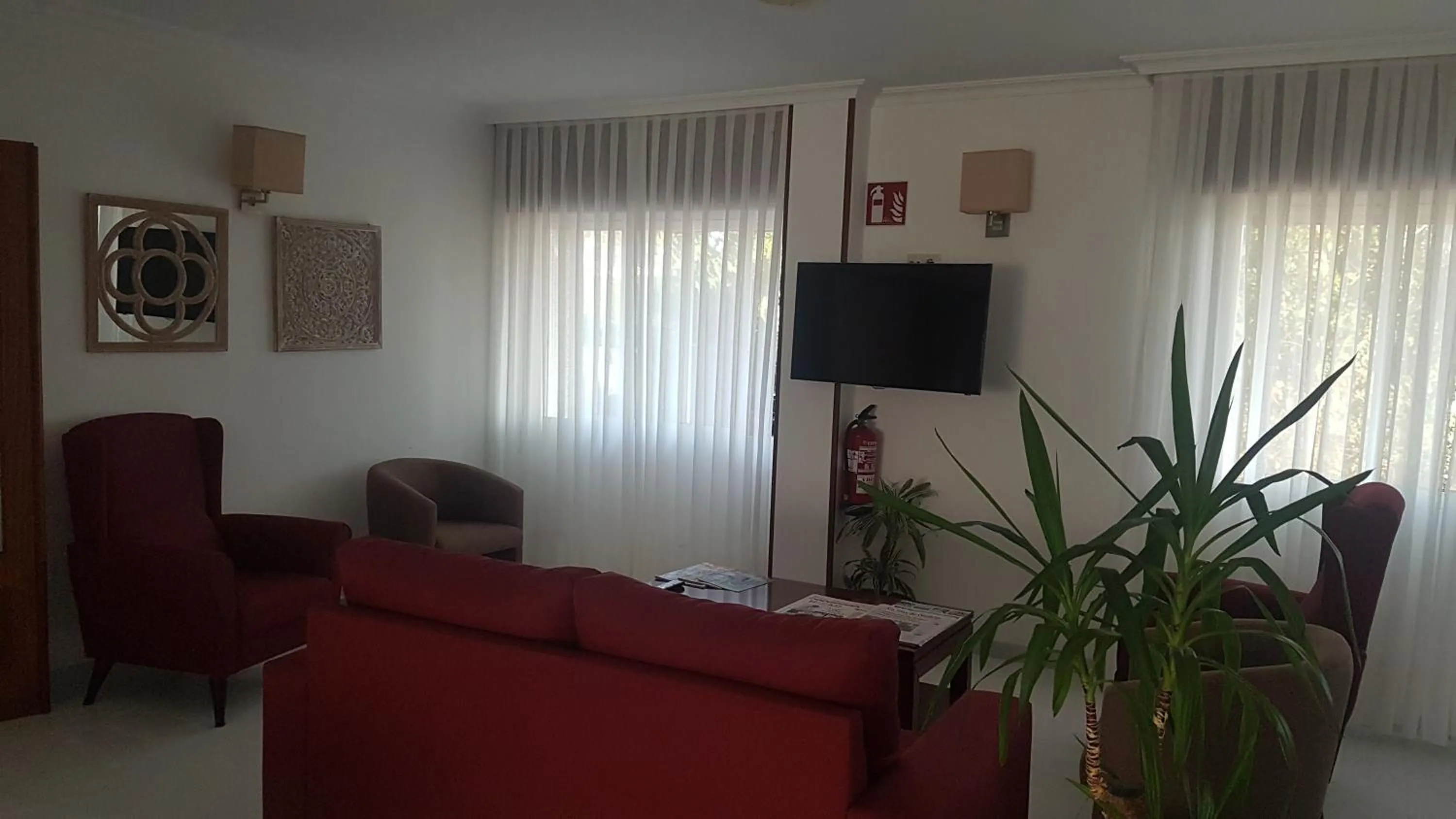 Communal lounge/ TV room in Hotel Punta Seame