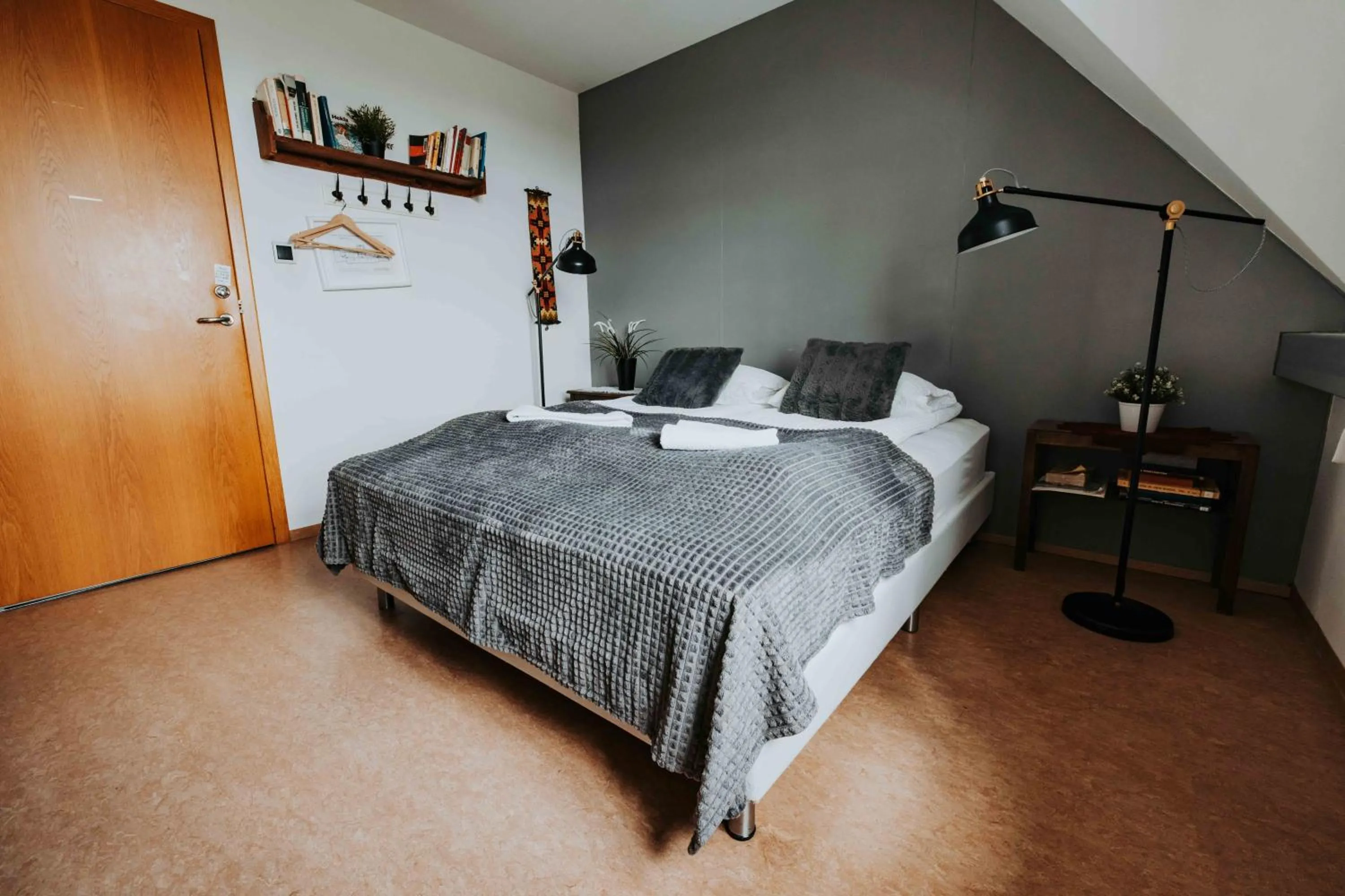 Bed in Héradsskólinn Historic Guesthouse