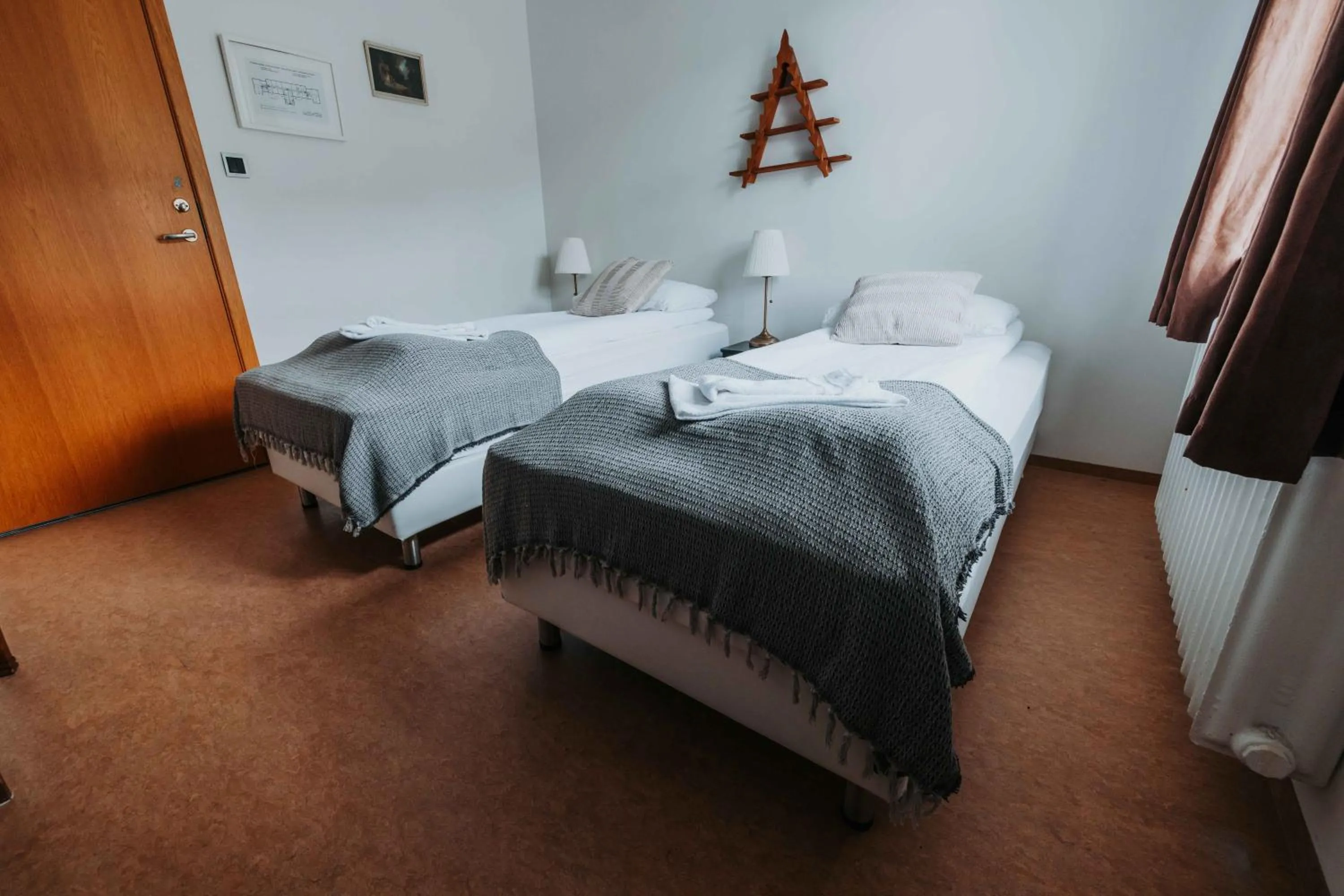 Bed in Héradsskólinn Historic Guesthouse