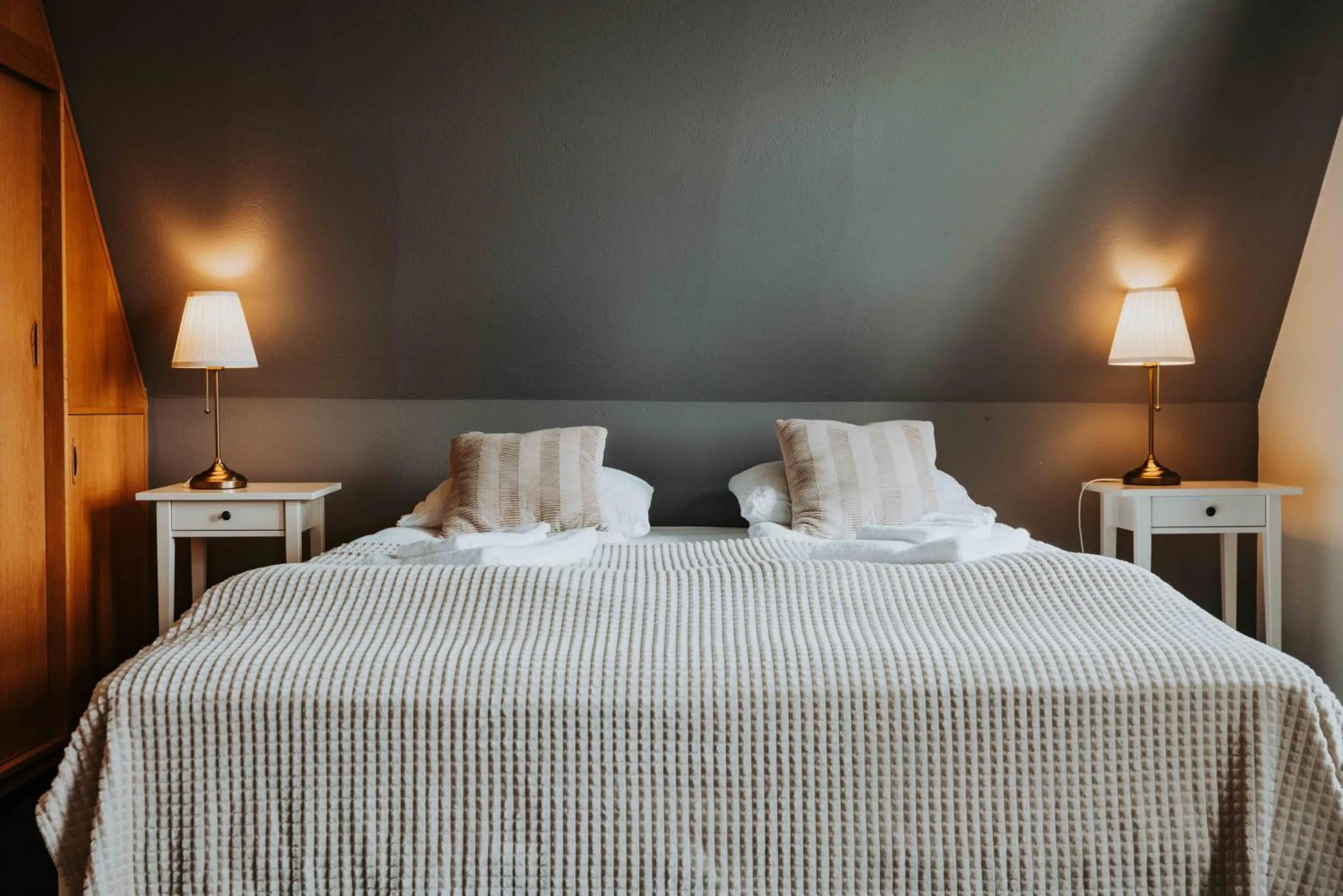 Bed in Héradsskólinn Historic Guesthouse