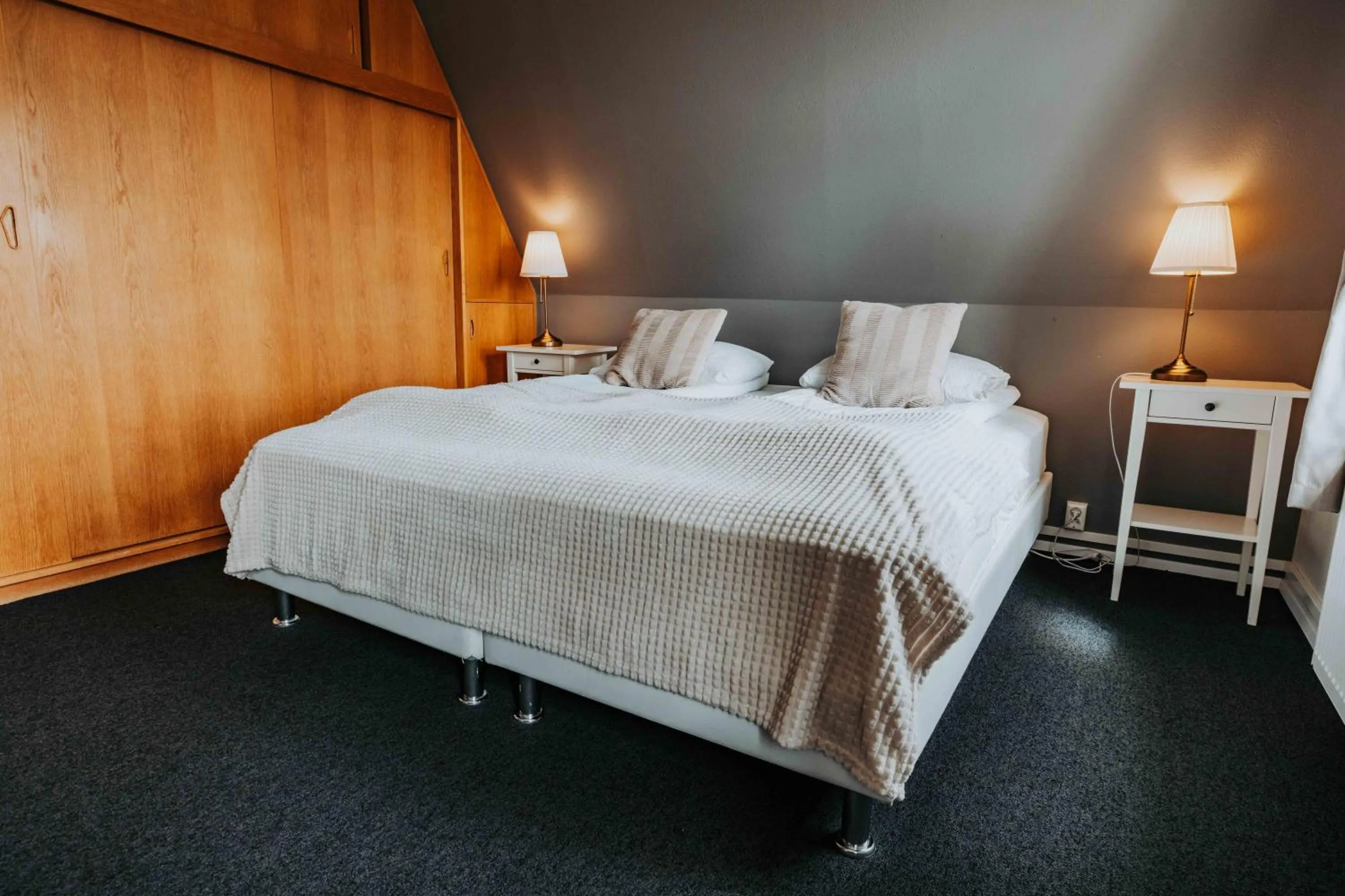 Bed in Héradsskólinn Historic Guesthouse