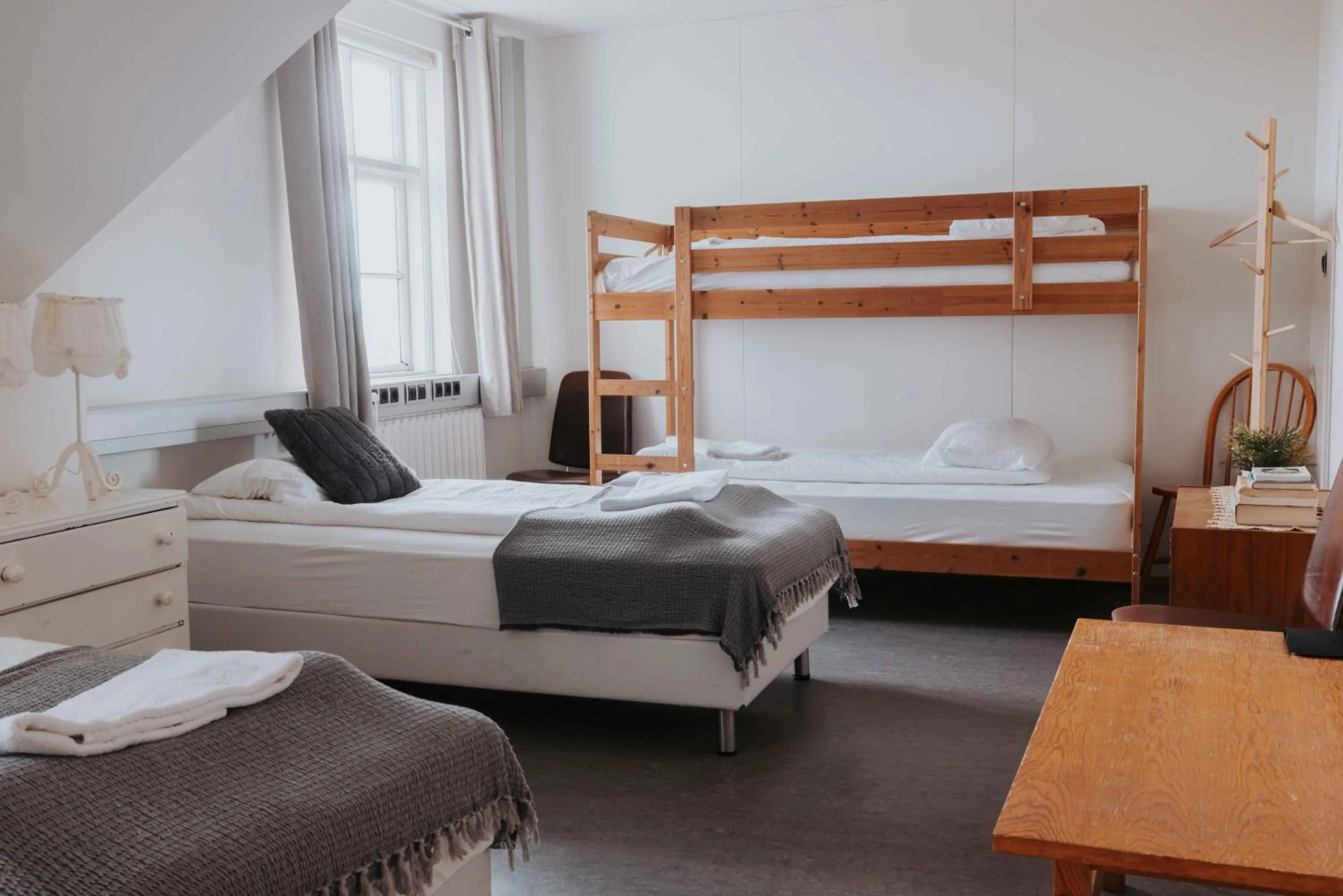 Bed in Héradsskólinn Historic Guesthouse