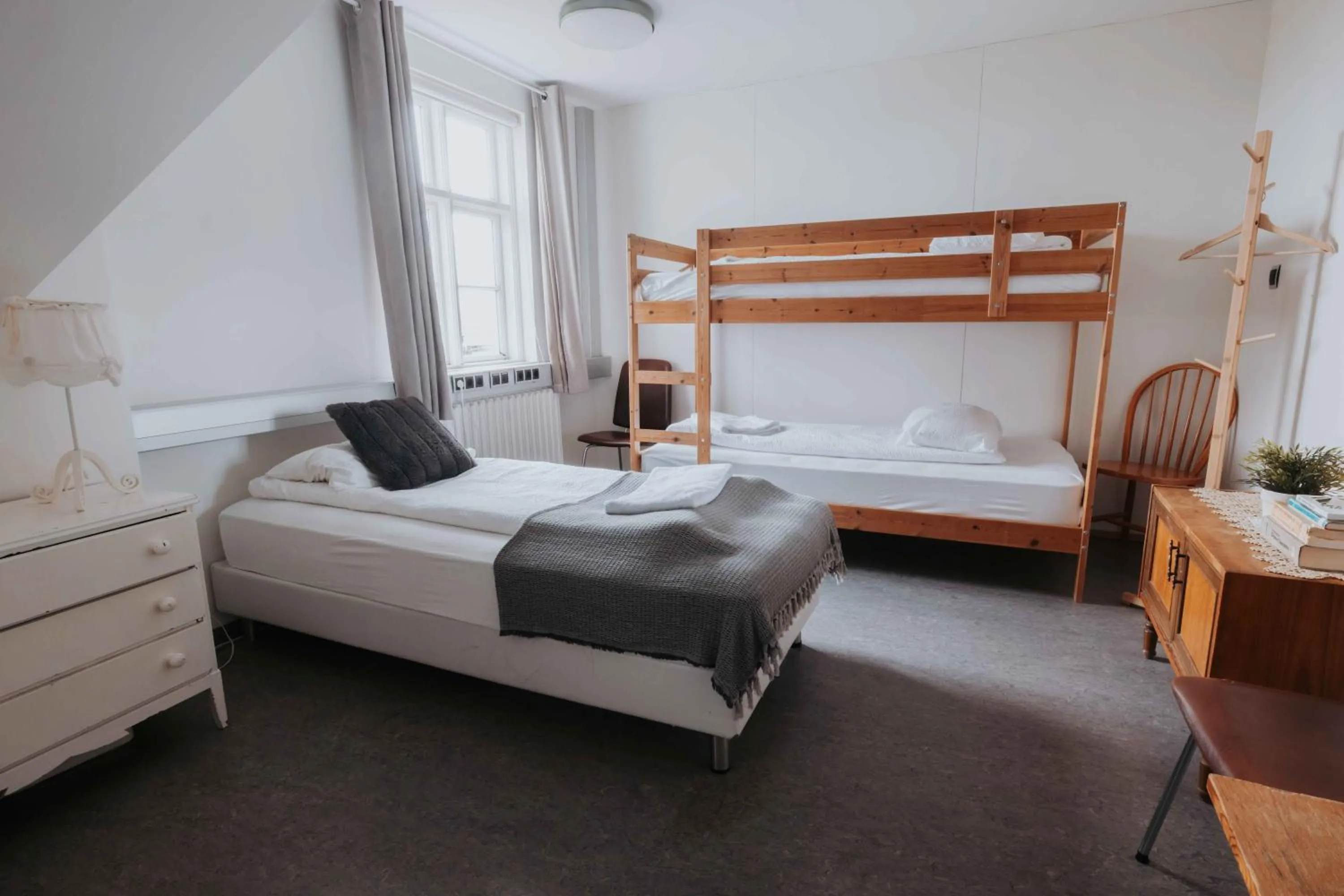 Bed in Héradsskólinn Historic Guesthouse