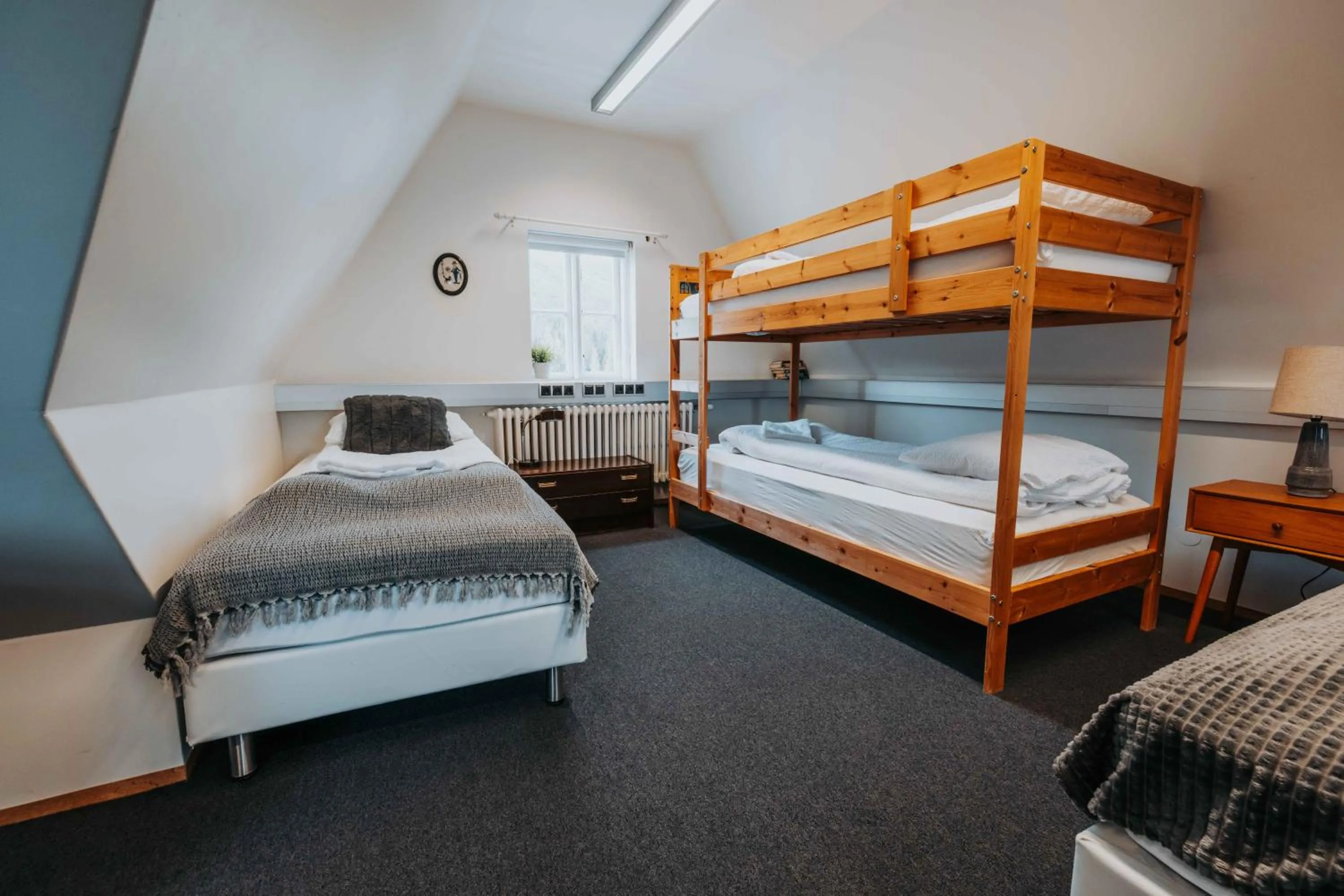 Bed in Héradsskólinn Historic Guesthouse