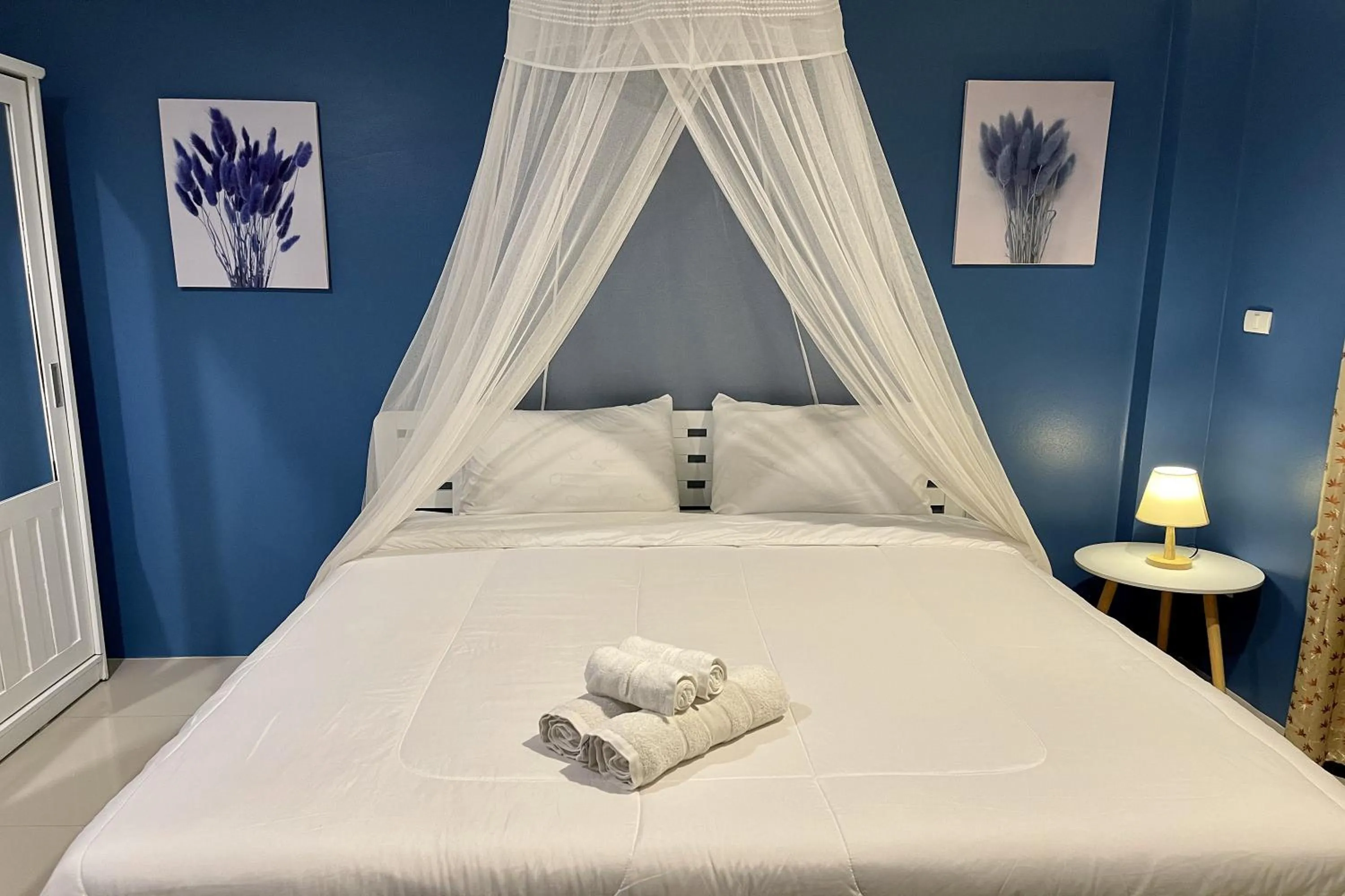 Bed in Be Rich Hotel