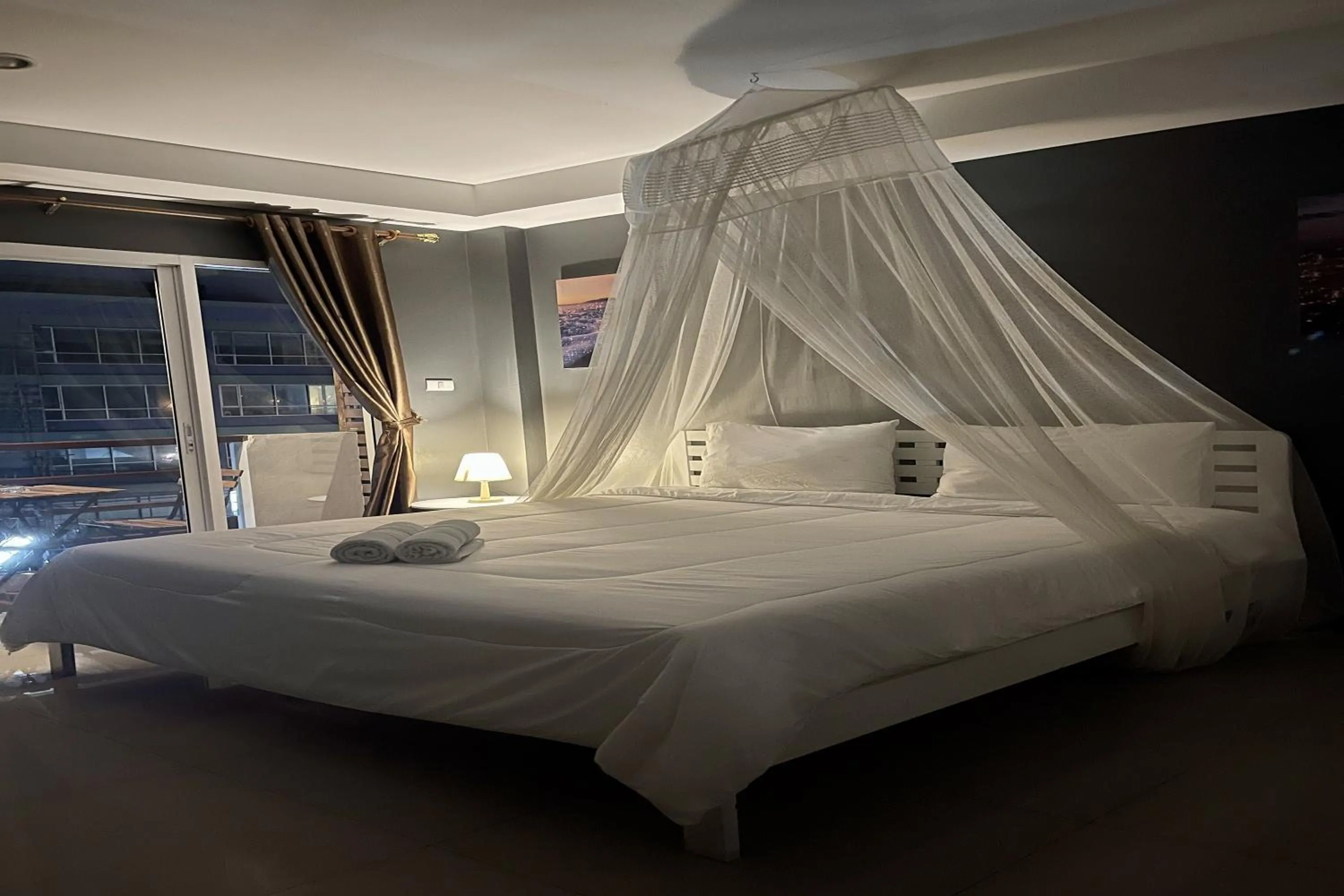 Bed in Be Rich Hotel