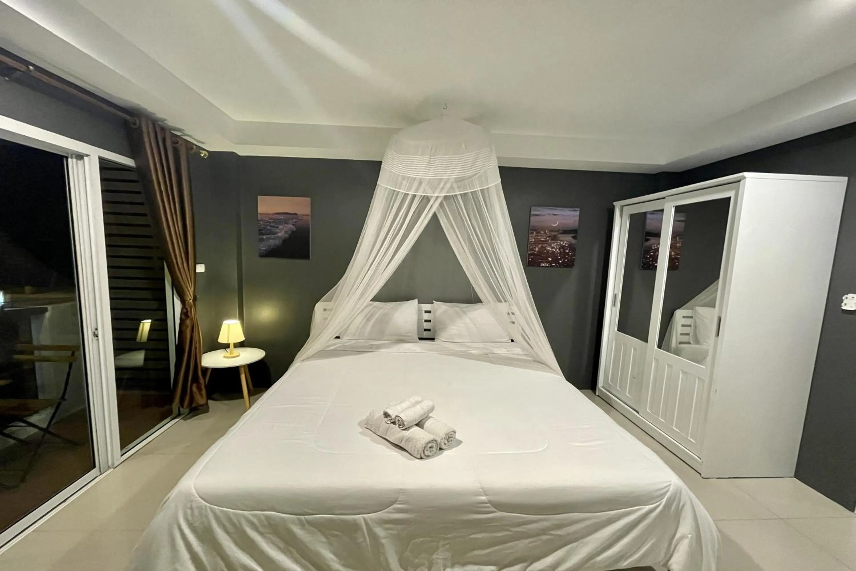 Bed in Be Rich Hotel