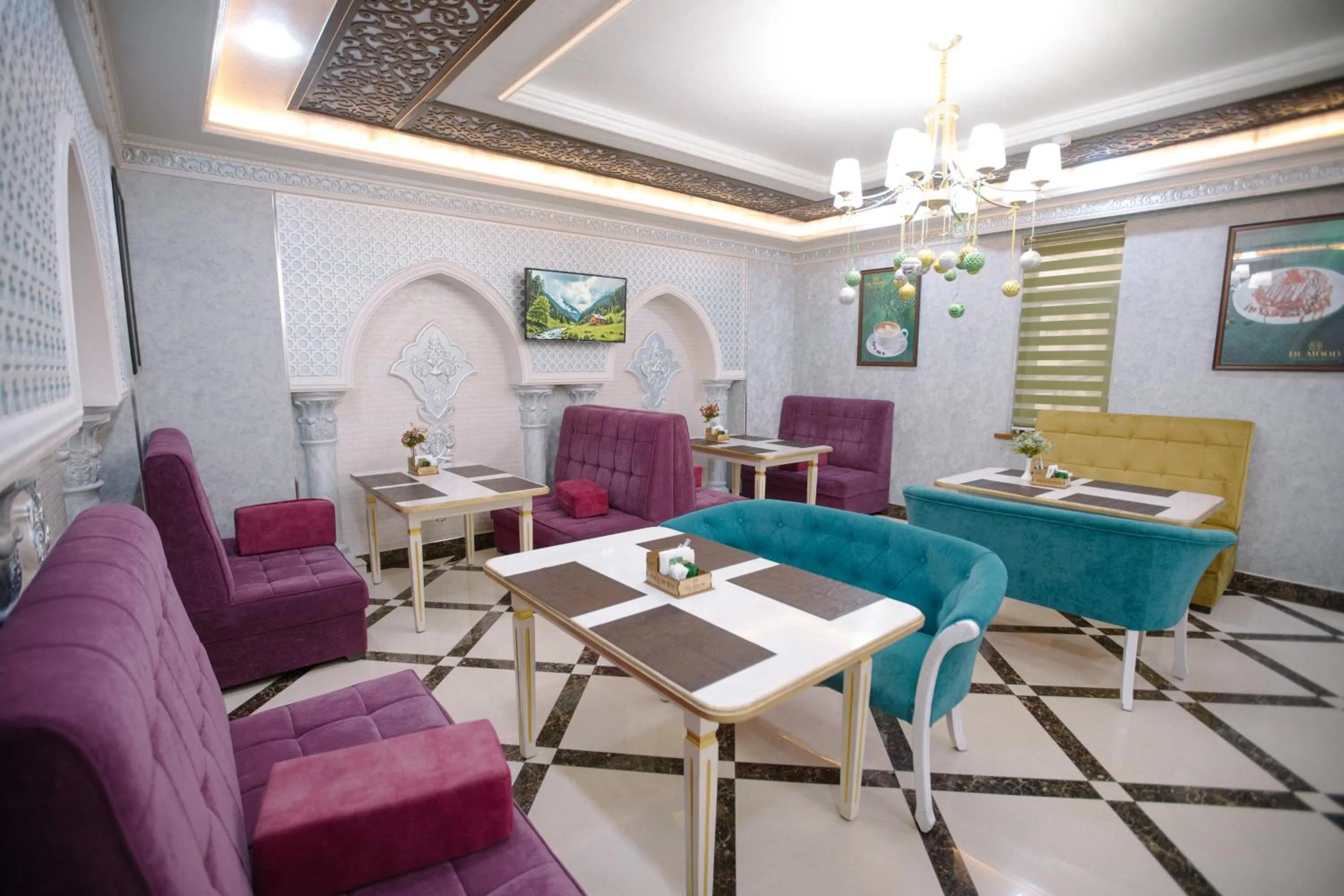 Seating area in Dendi Plaza Hotel