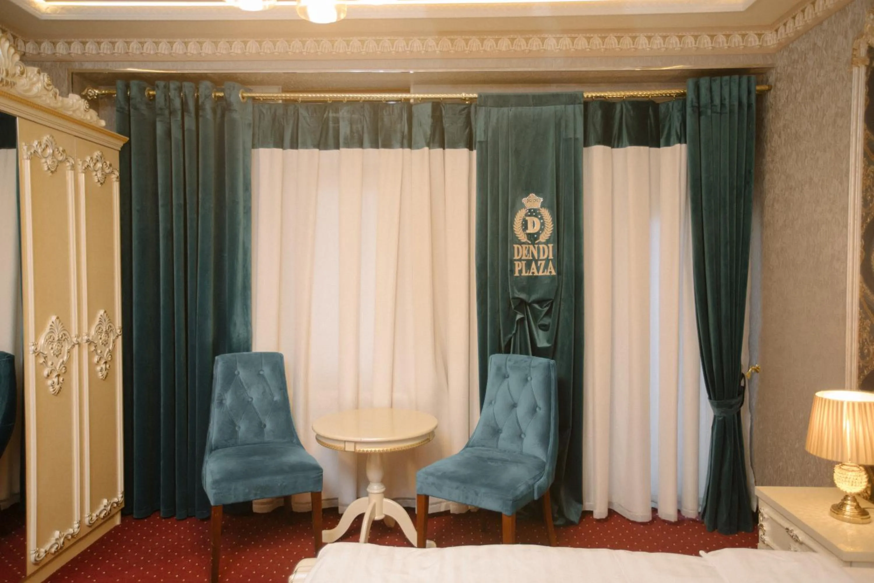 Seating area in Dendi Plaza Hotel