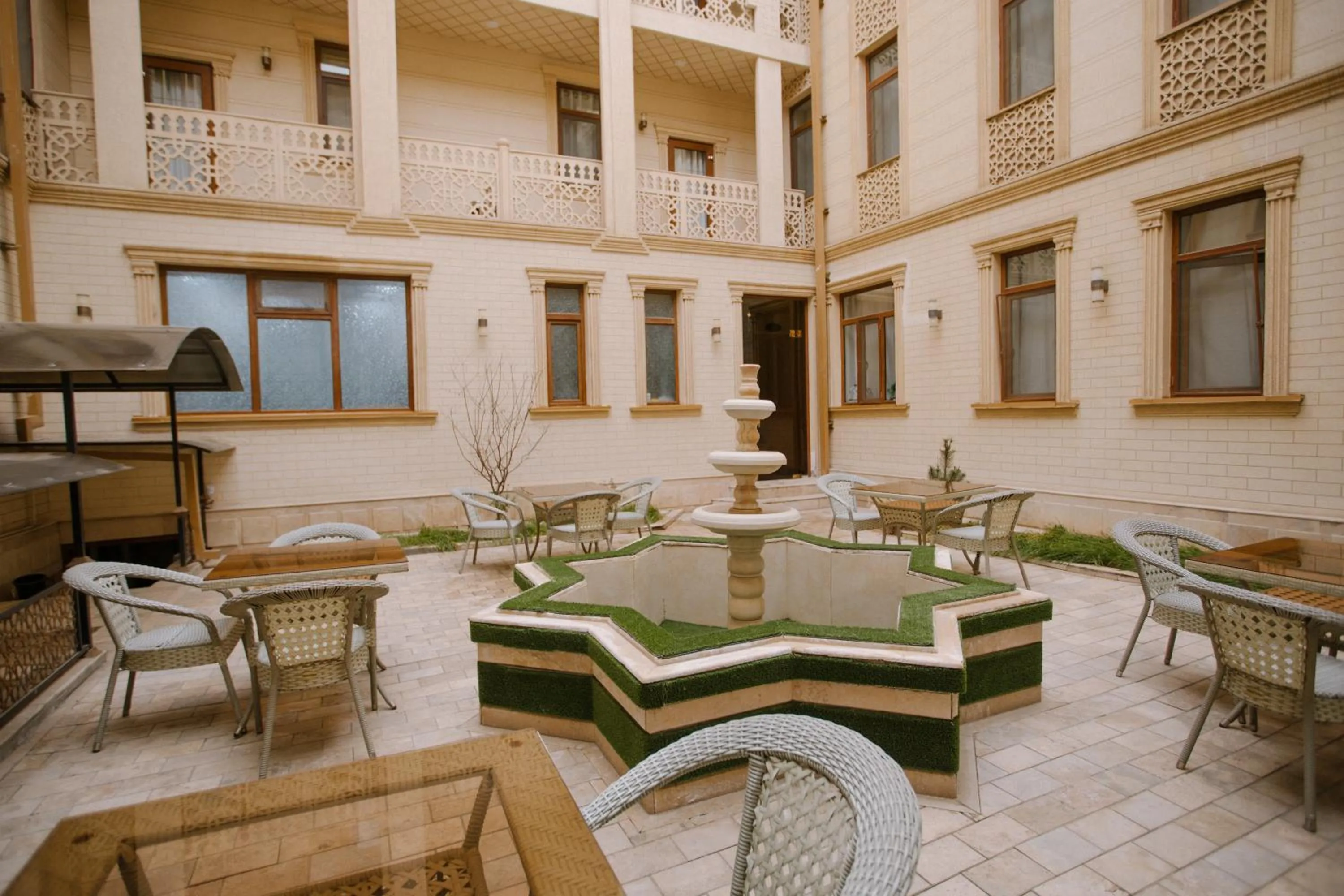 Patio in Dendi Plaza Hotel