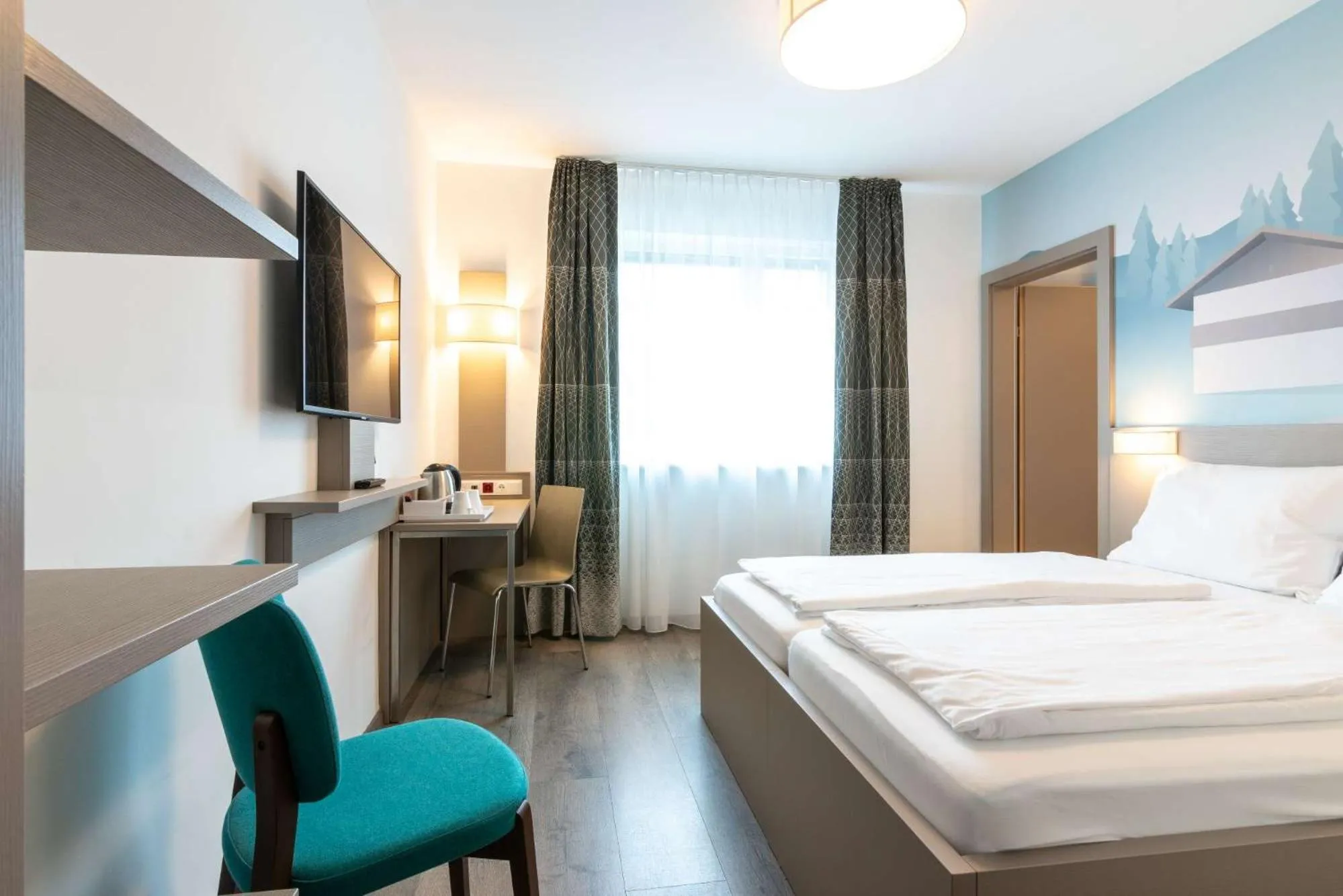 Photo of the whole room, Bed in Best Western Hotel Kiefersfelden