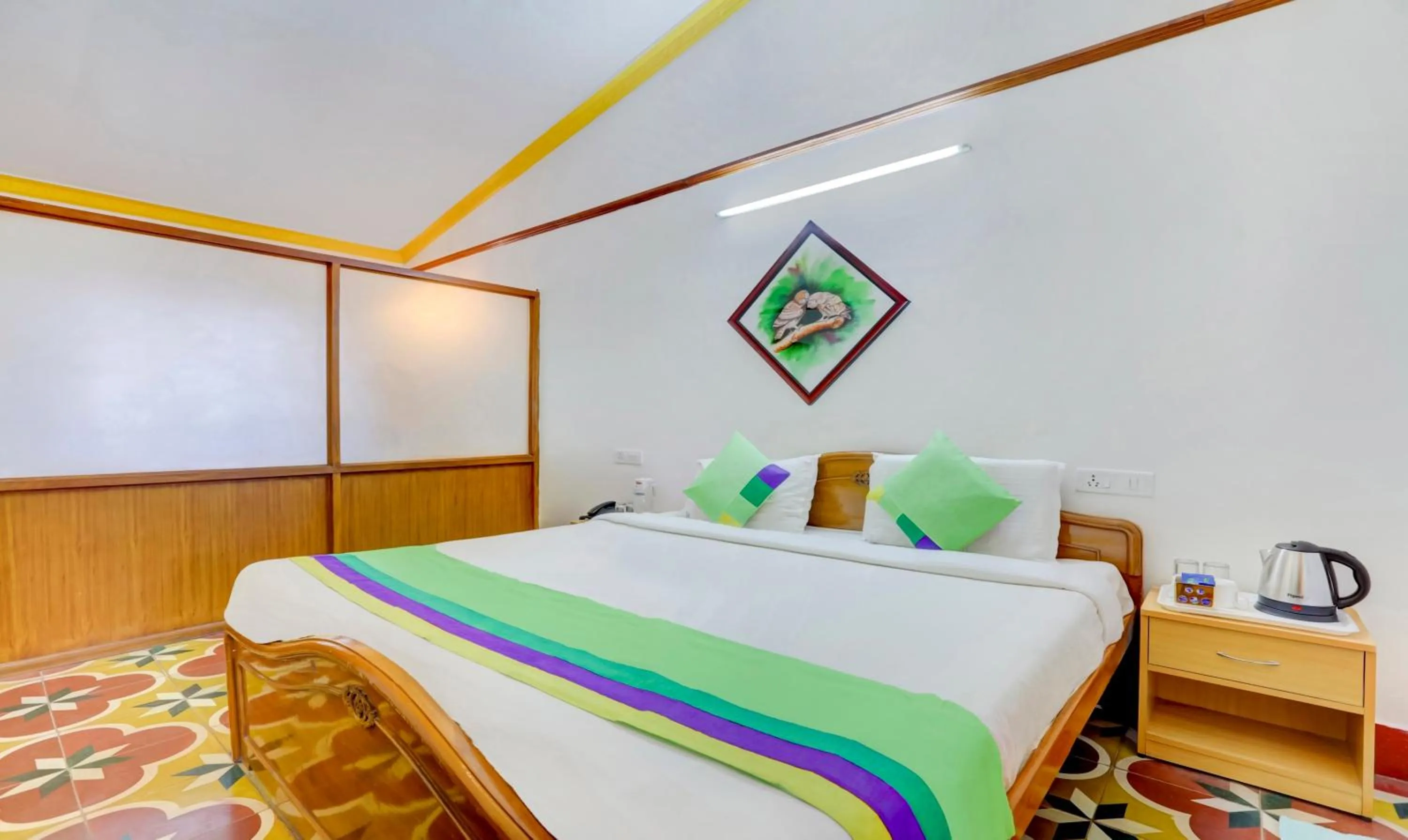 Bedroom, Bed in Treebo Atithi Bhavan, 1 Km From Ooty Lake